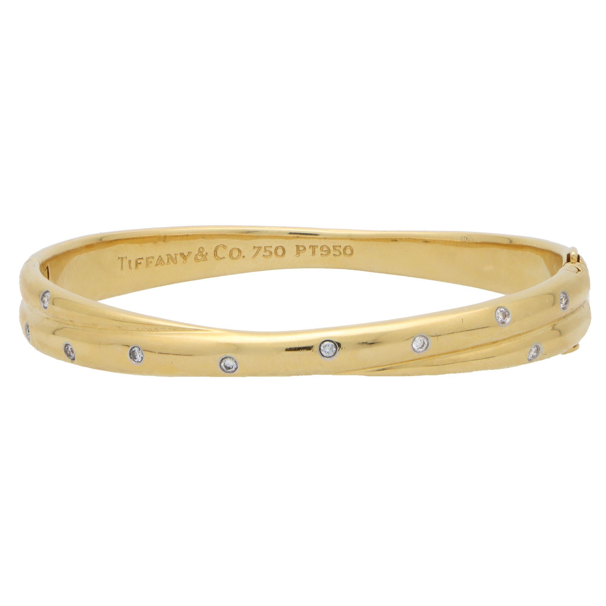 Round Cut Vintage Tiffany & Co. Etoile Diamond Crossover Bangle in 18k Yellow Gold