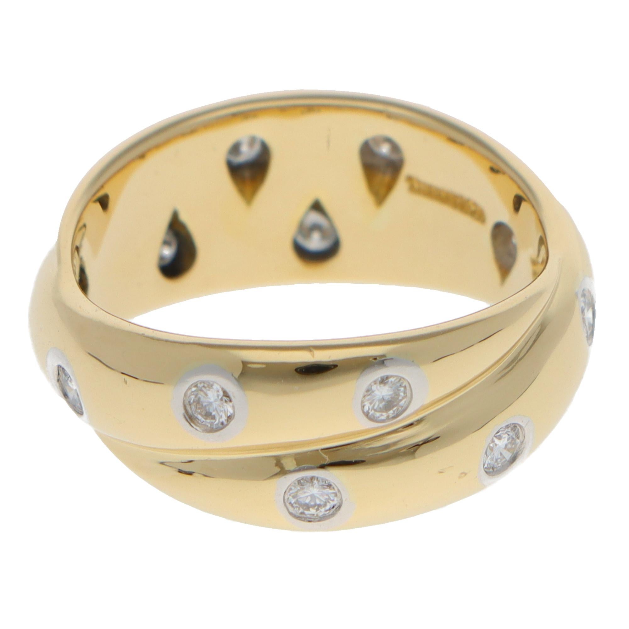 Modern Vintage Tiffany & Co. Etoile Diamond Twist Ring in Yellow Gold For Sale