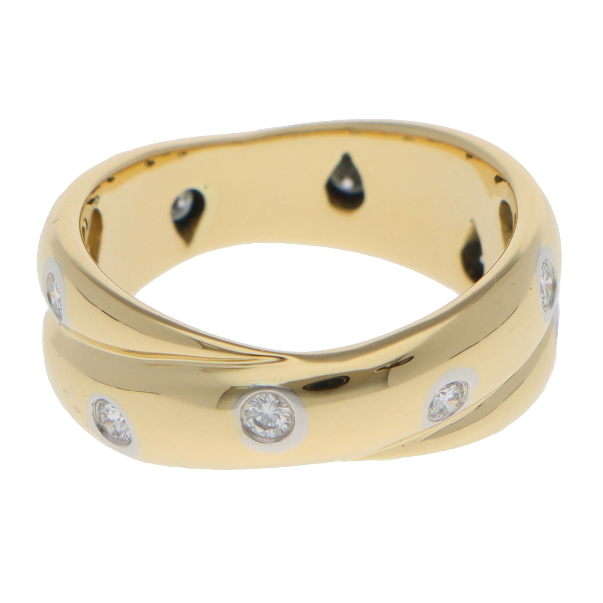 Round Cut Vintage Tiffany & Co. Etoile Diamond Twist Ring in Yellow Gold For Sale