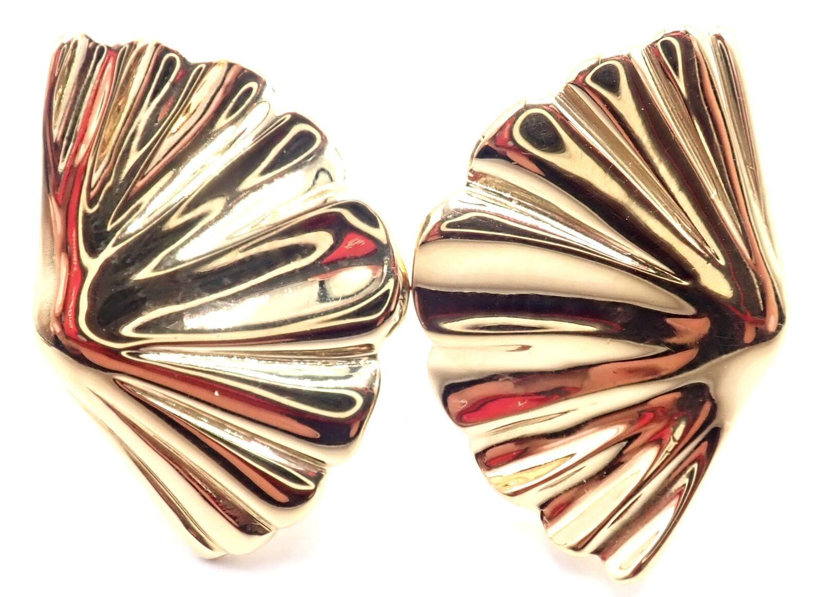 18k Yellow Gold Vintage Fan Shell Earrings by Tiffany & Co. 
These earrings are made for not pierced ears, but they can be converted for pierced ears by adding posts.
Details: 
Weight: 11.7 grams
Measurements: 26mm x 17mm
Stamped Hallmarks: T&Co 18k