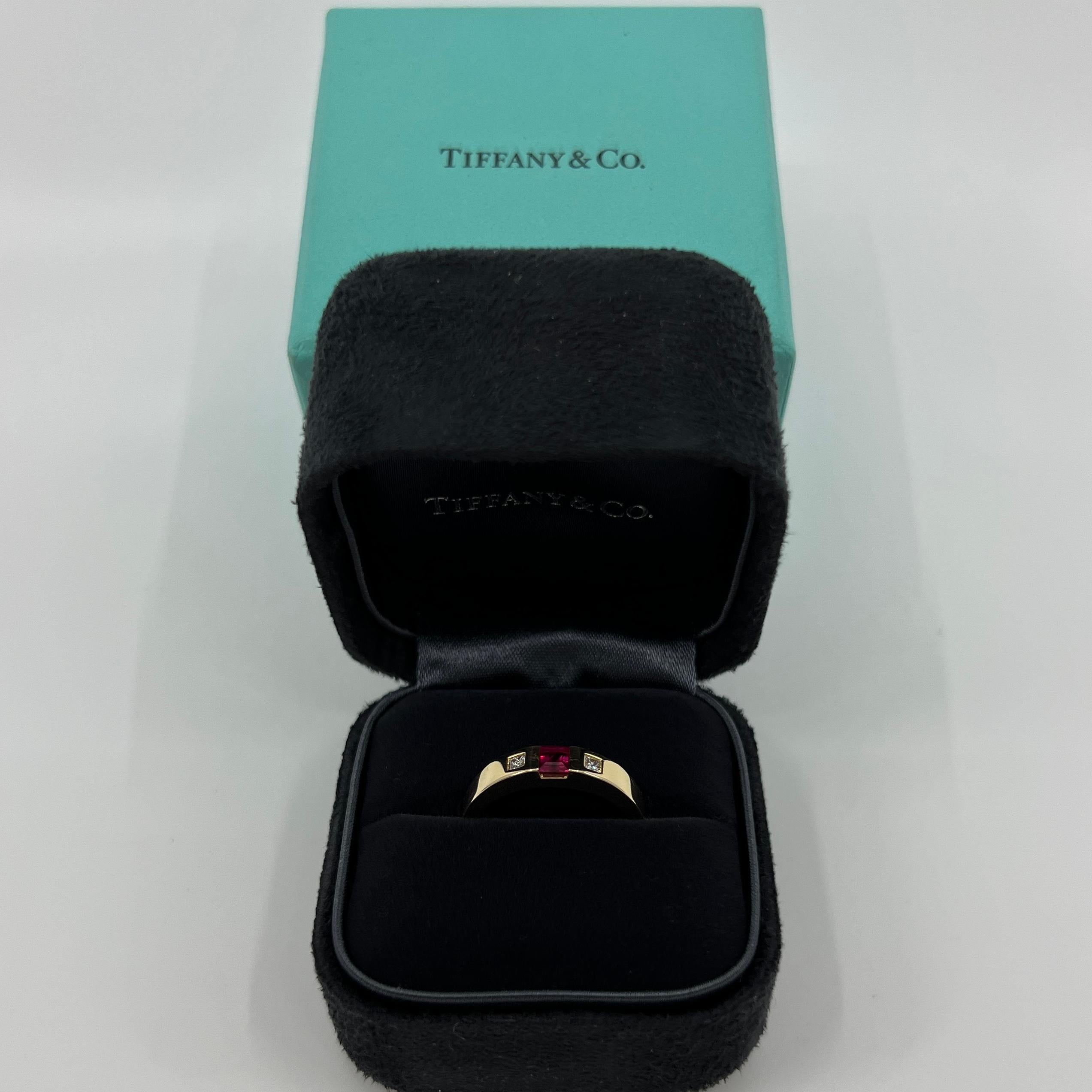 Tiffany & Co Fine Pink Red Ruby & Diamond 18k Yellow Gold Three Stone Band Ring.

Stunning yellow gold ring set with a fine deep pink red ruby and 2 princess cut diamonds.

Fine jewellery houses like Tiffany only use the finest diamonds and