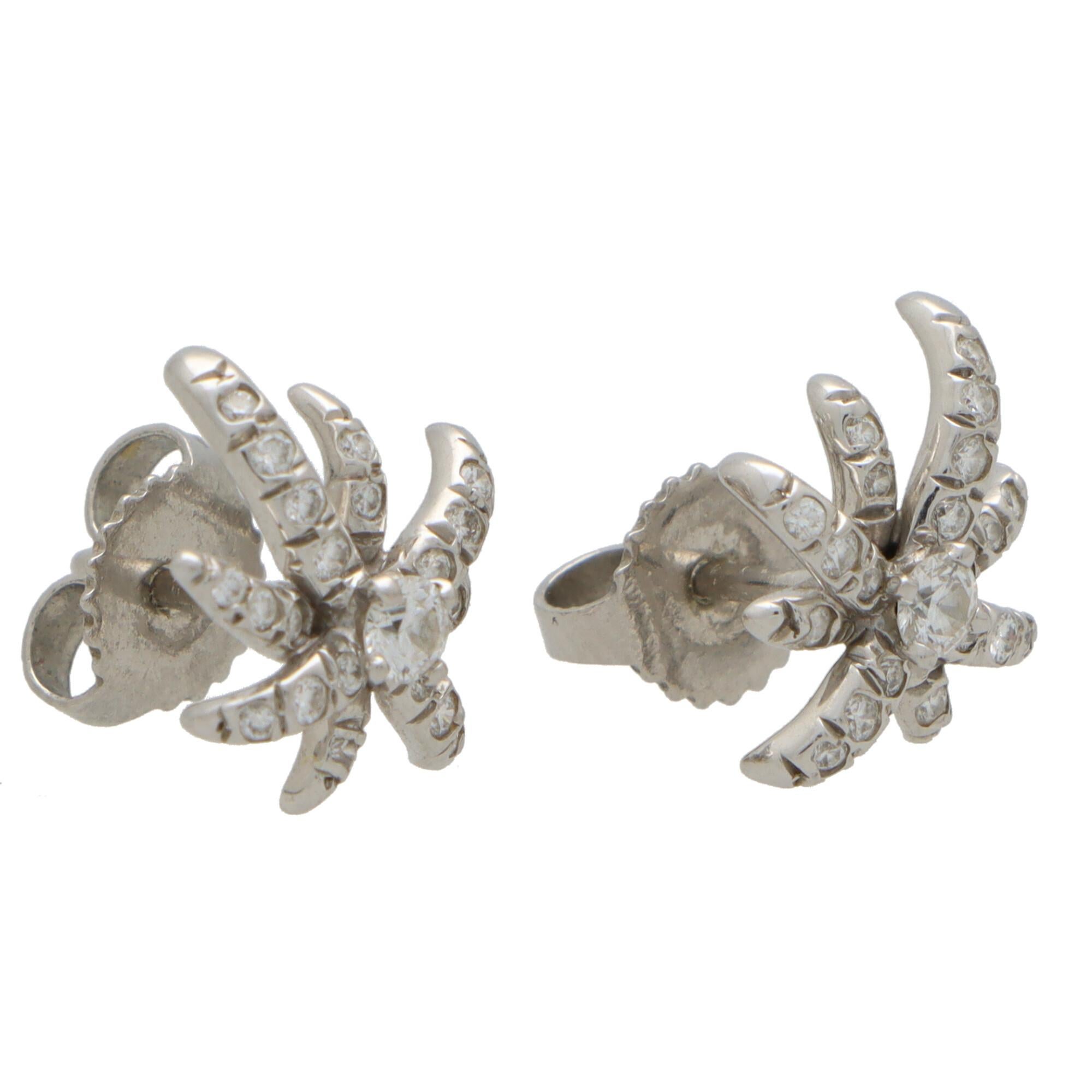 A beautiful pair of vintage Tiffany & Co. ‘Fireworks’ diamond stud earrings set in platinum.

From the now discontinued ‘Fireworks’ collection, each earring is composed of a firework motif which is pave set with round brilliant cut diamonds. Central