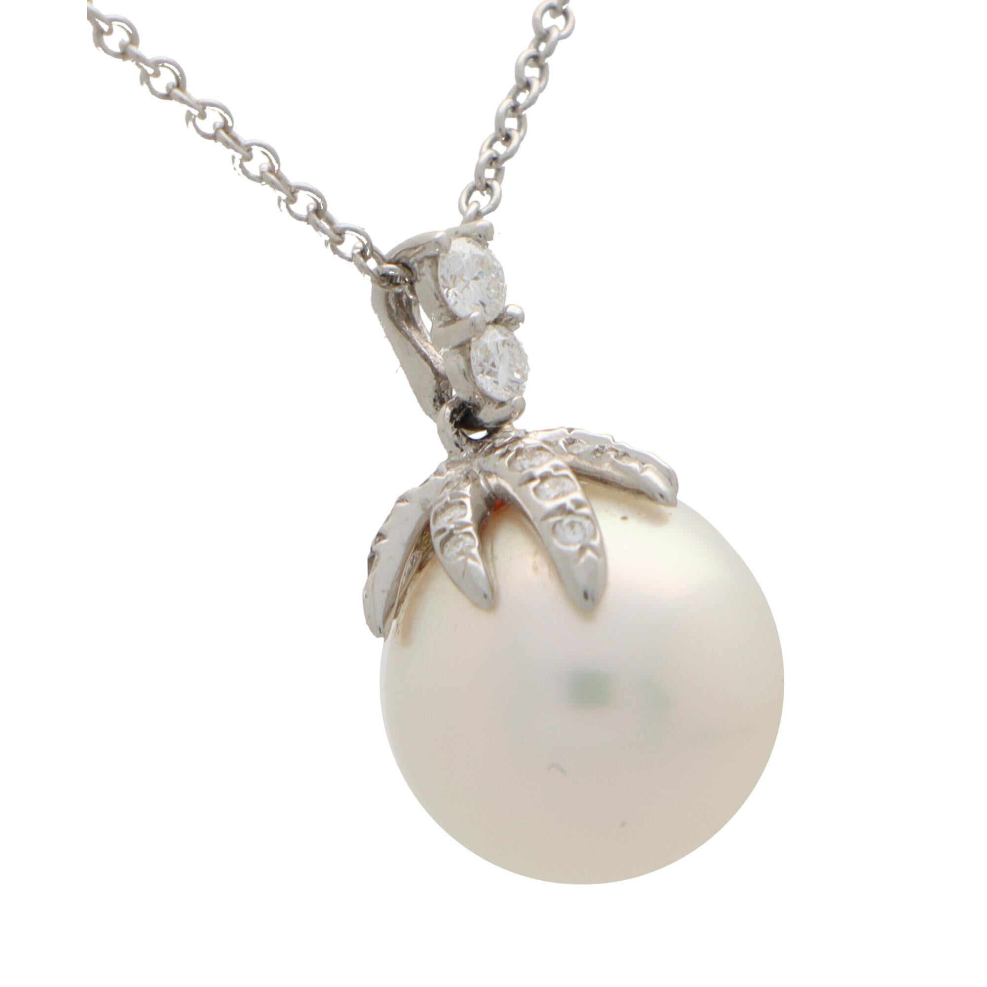 Modern Vintage Tiffany & Co. Fireworks Pearl and Diamond Pendant Necklace in Platinum