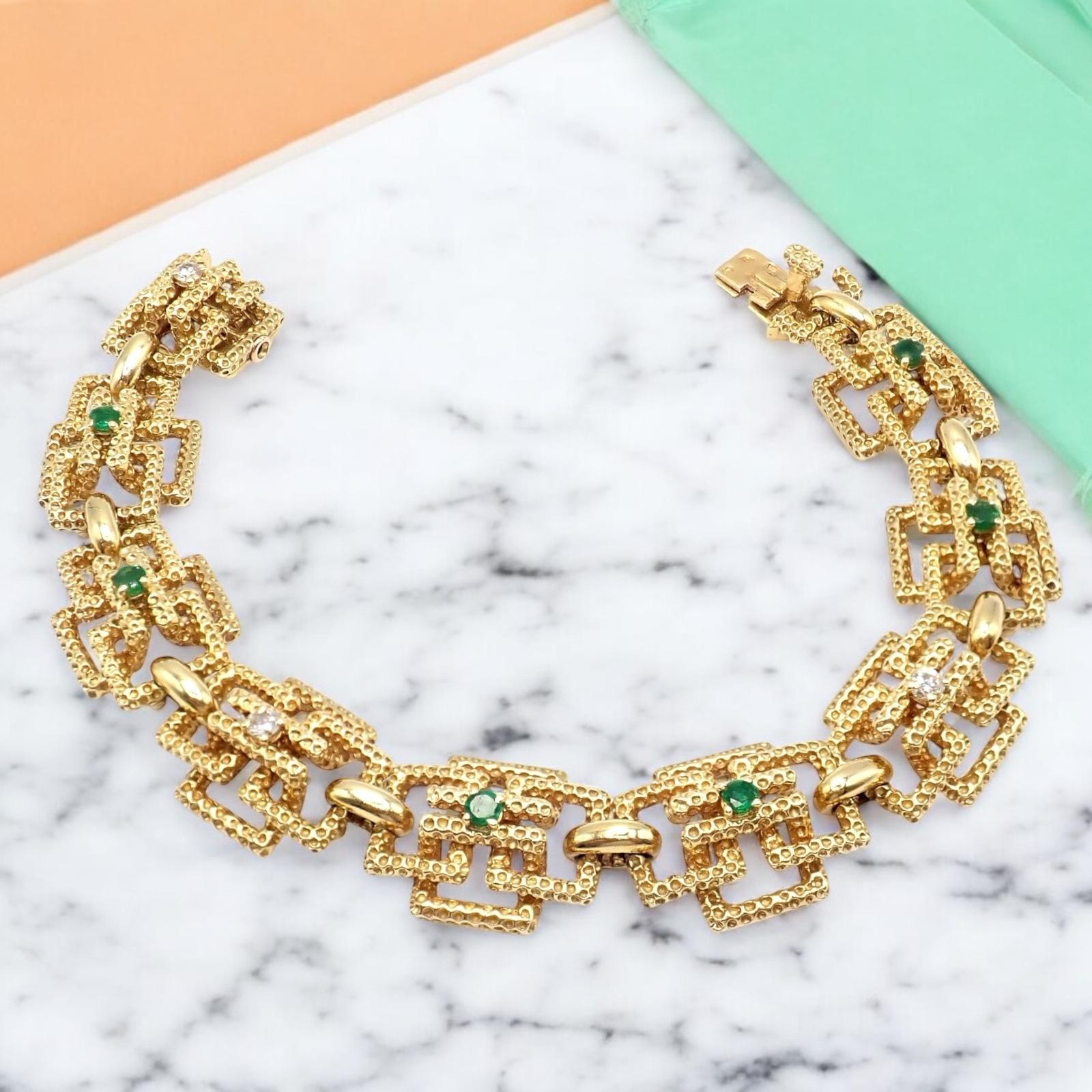 A testament to timeless elegance, this Vintage Tiffany & Co France 18k Yellow Gold Diamond Emerald Bracelet showcases exquisite craftsmanship. 

Crafted from radiant 18k gold, it sparkles with brilliant-cut diamonds, interspersed by lush emerald