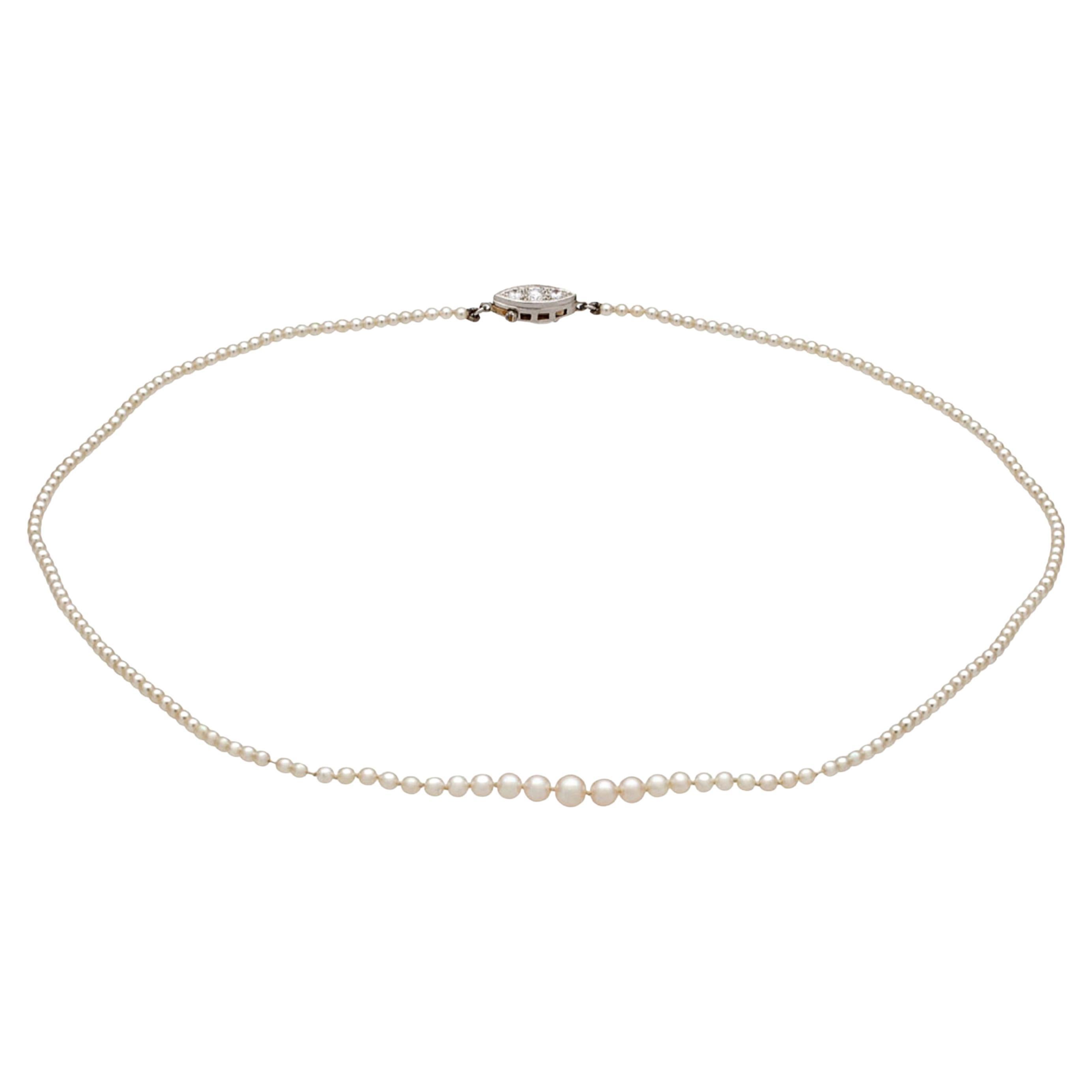 Tiffany & Co. d'epoca. GIA Collana di perle e diamanti da 16" con perle naturali e platino in vendita