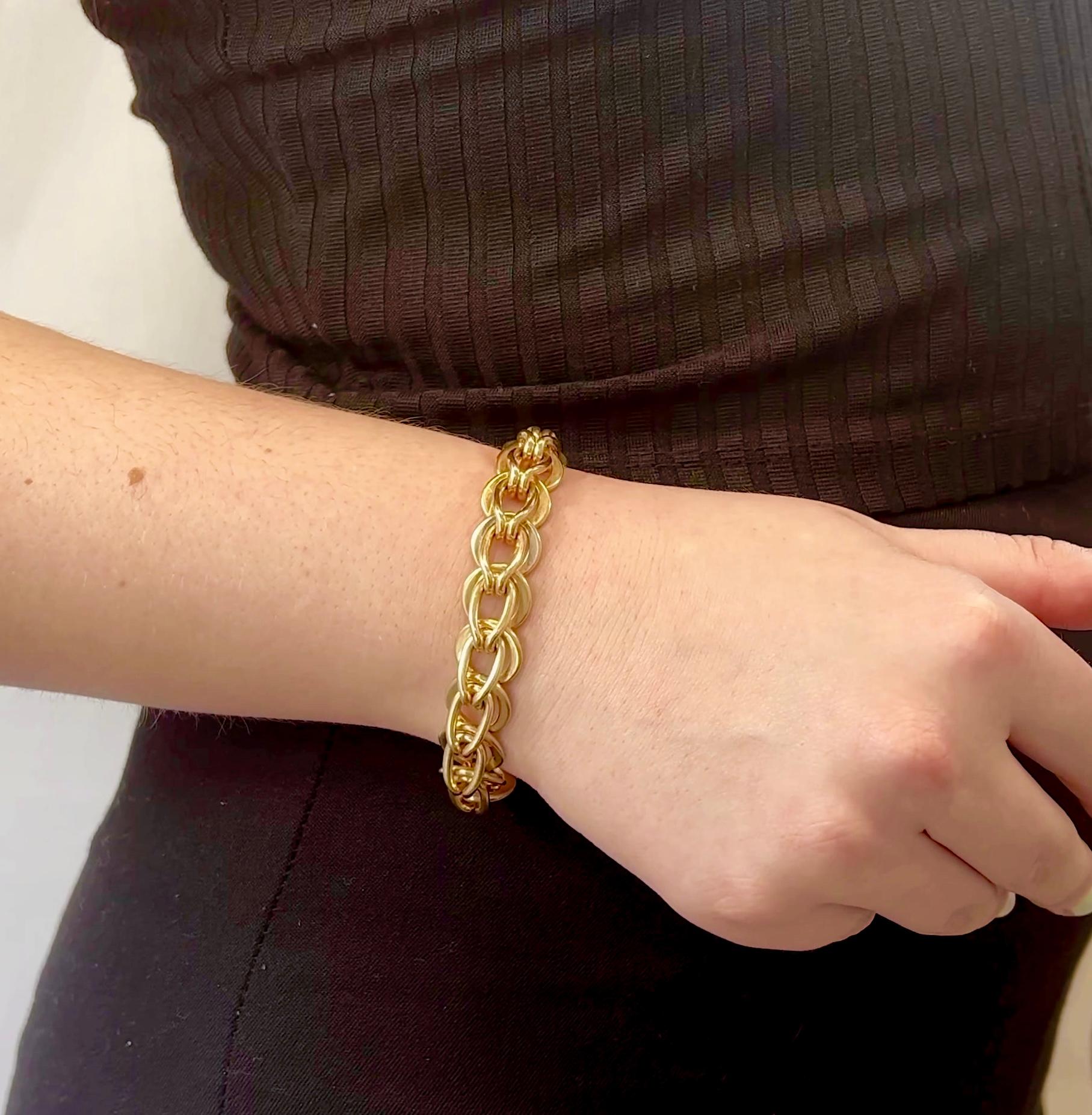 One Vintage Tiffany & Co. Gold Bracelet. Crafted in 14 karat yellow gold, signed Tiffany & Co., with purity mark. Circa 1960s. The bracelet measures 7 inches in length. 

About this Item: This Vintage Tiffany & Co. Bracelet is symbolic of the style