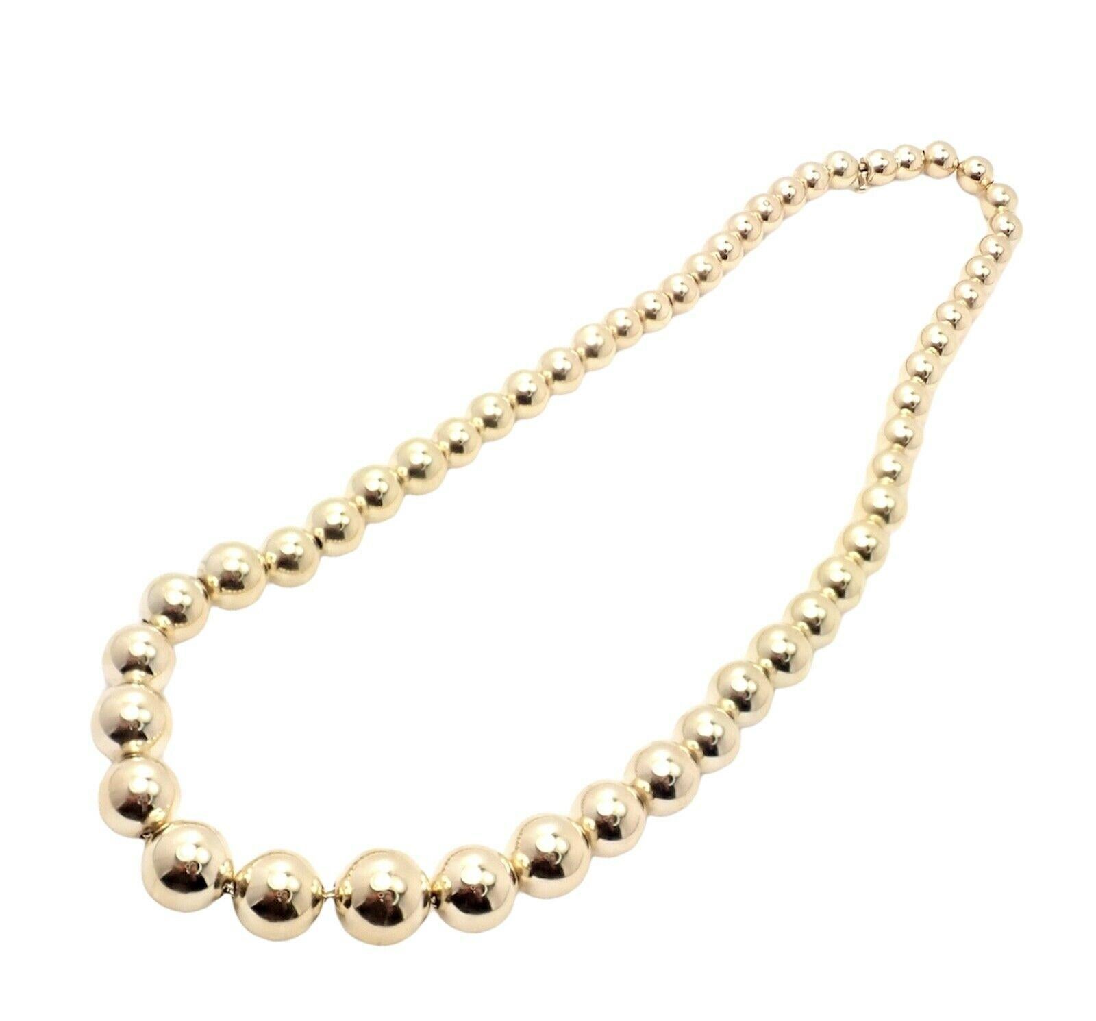14k Yellow Gold Graduated Bead Necklace by Tiffany & Co.
Details:
Length: 16