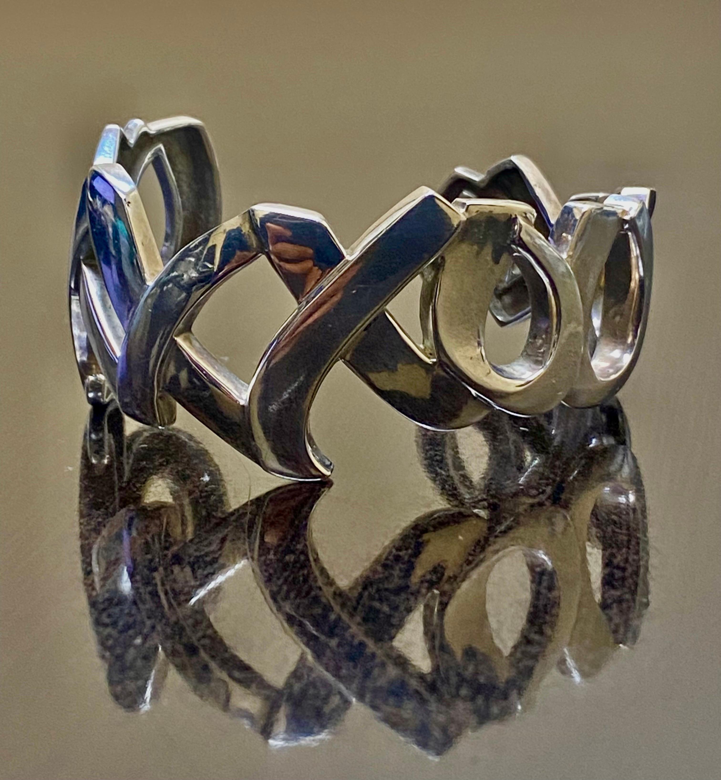 Vintage Tiffany & Co. Graffiti Love and Kisses Silver Cuff Bracelet In Excellent Condition For Sale In Los Angeles, CA