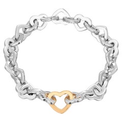 Bracelet vintage Tiffany Co en forme de cœur en or jaune 18 carats et argent sterling 