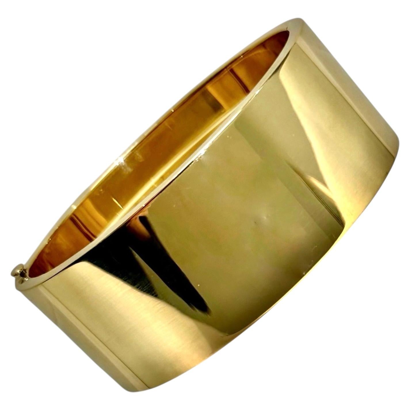 Tiffany & Co. d'epoca. Bracciale a cerniera in oro lucido, ovale, largo 2,5 cm in vendita