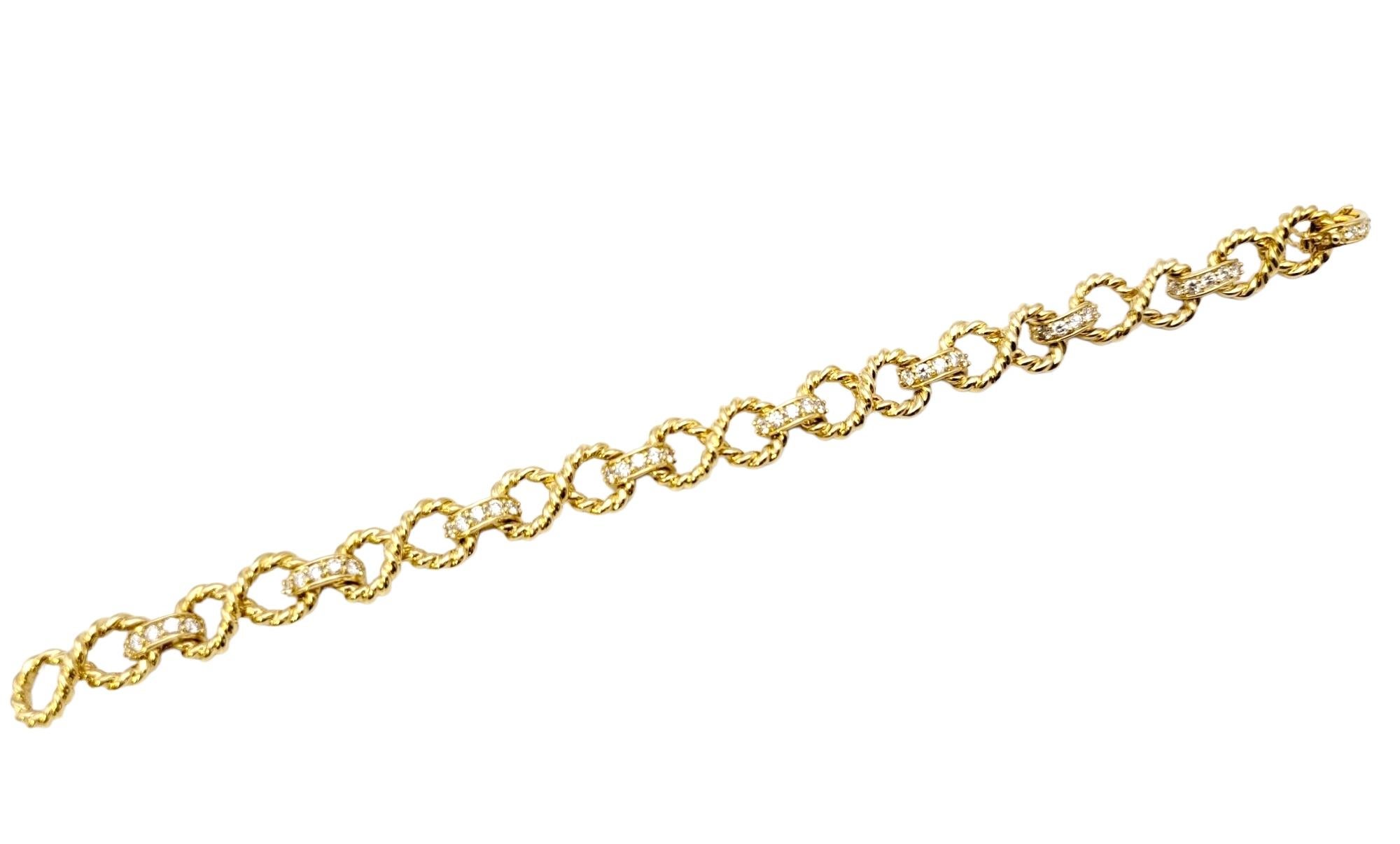 Round Cut Vintage Tiffany & Co. Infinity Link Bracelet with Diamonds 18 Karat Yellow Gold