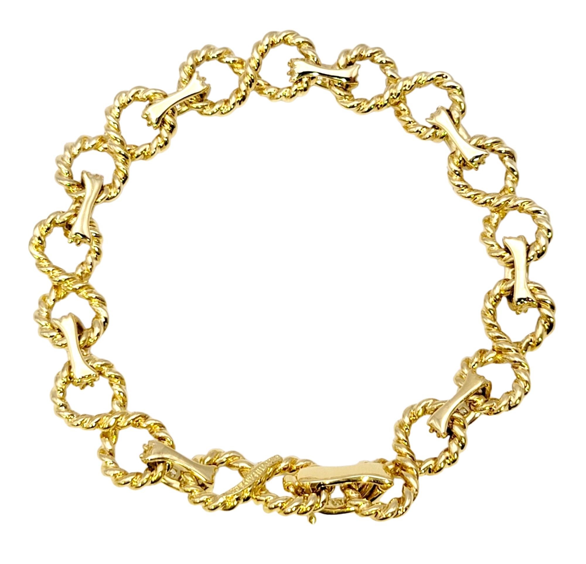 Vintage Tiffany & Co. Infinity Link Bracelet with Diamonds 18 Karat Yellow Gold In Good Condition In Scottsdale, AZ