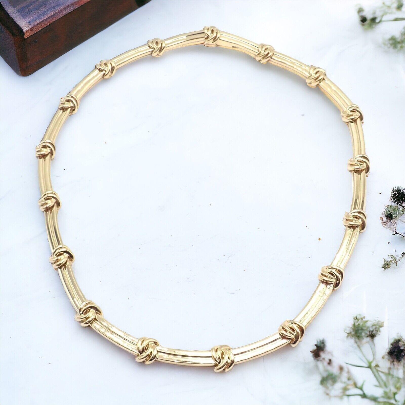 Collana A. Link & Co. in oro giallo 18k vintage di Tiffany & Co.
La collana vintage A. Link & Co. in oro giallo 18k è caratterizzata da una serie di maglie a nodo dal design intricato, realizzate in lussuoso oro giallo 18k. 
Questo elegante pezzo