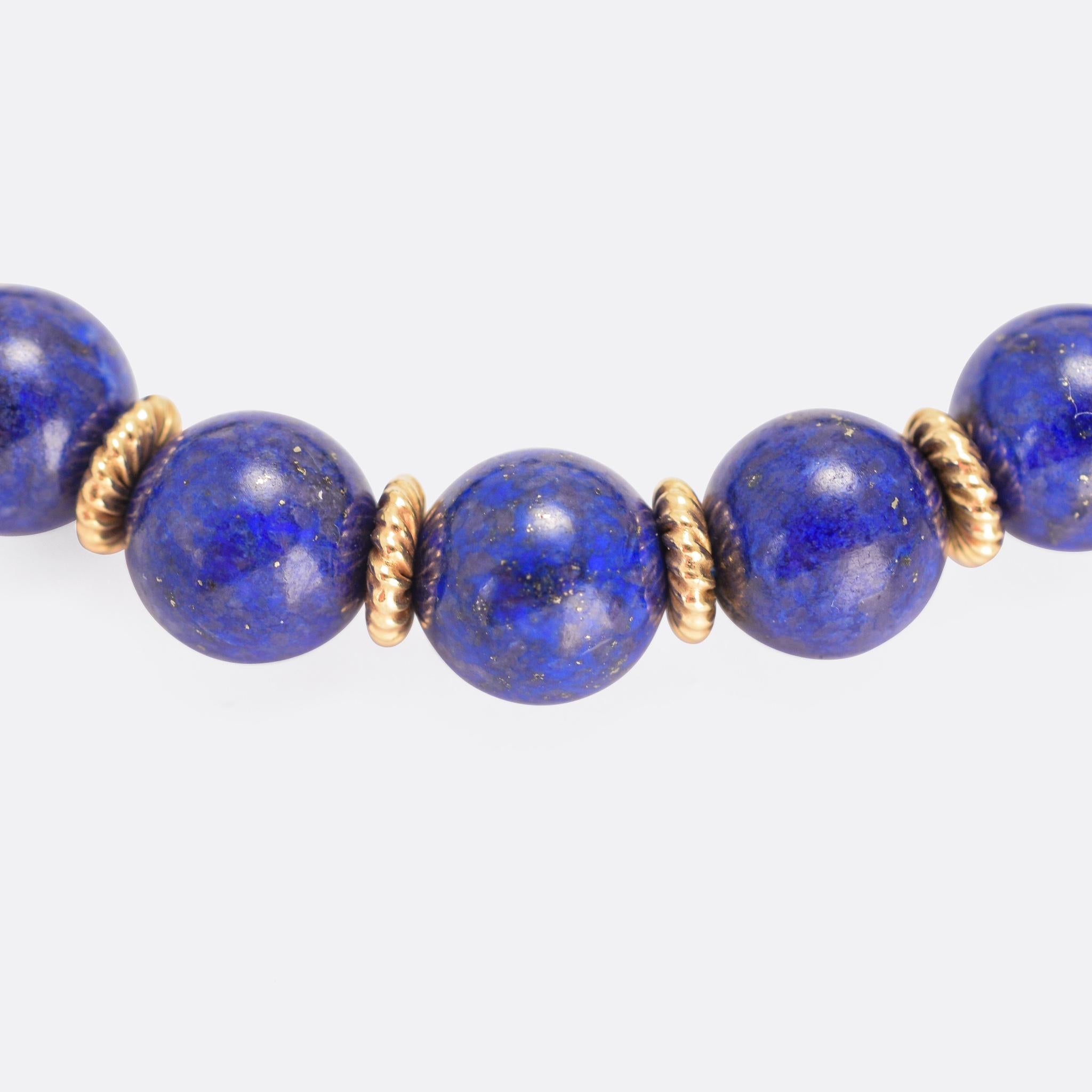 Gorgeous vintage Tiffany & Co lapis bead bracelet, with striking blue stones complemented perfectly by yellow gold spacers. It dates from the 1960s, crafted in 14 karat gold and of superb quality and taste.

STONES 
Lapis Lazuli

MEASUREMENTS
