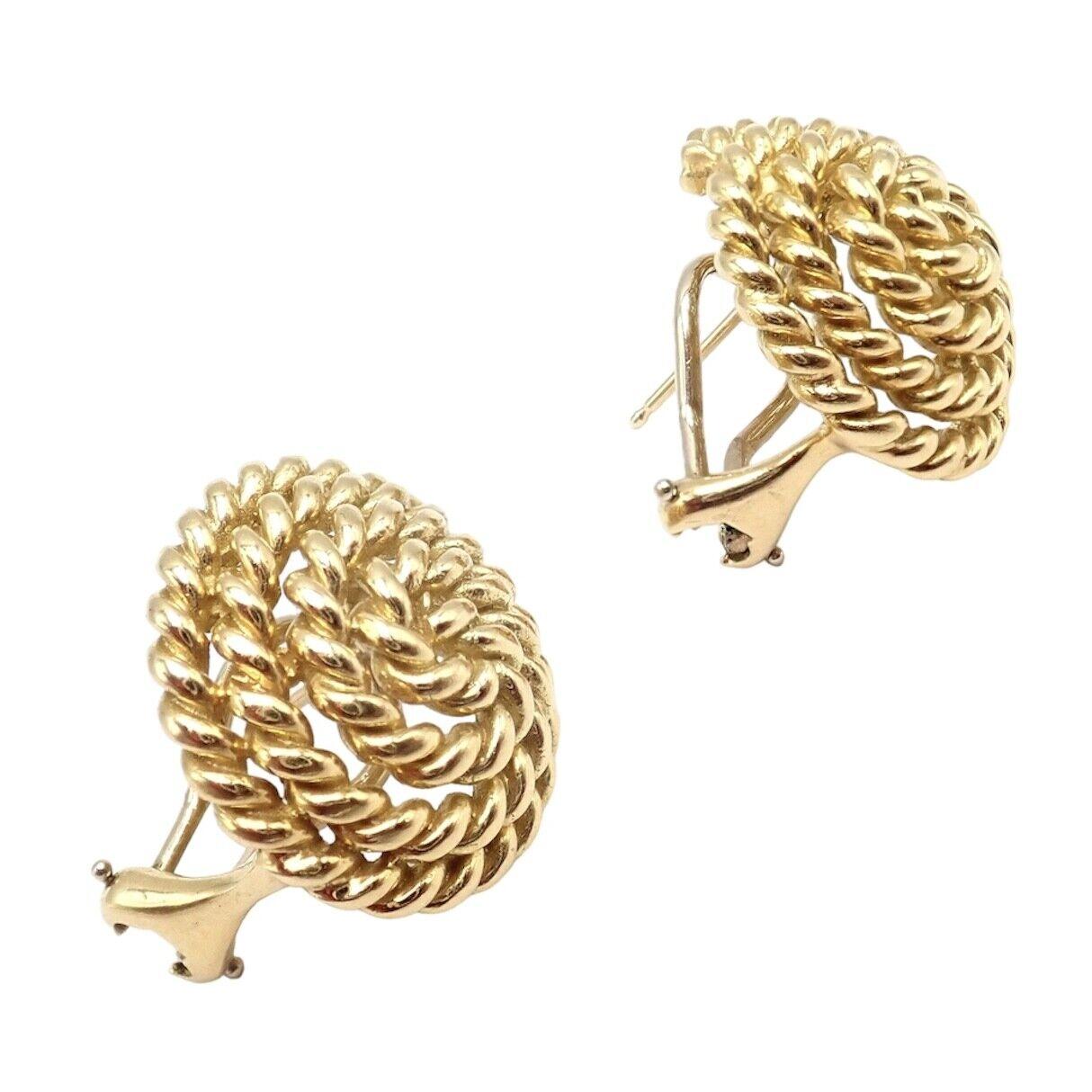 18k Yellow Gold Vintage Large Coiled Rope Earrings by Tiffany & Co. 
These earrings are made for pierced ears.
Details: 
Weight: 20.1 grams
Measurements: 20mm x 20mm
Stamped Hallmarks: Tiffany&Co 18k
YOUR PRICE: $3,850
Ti947mhtd
