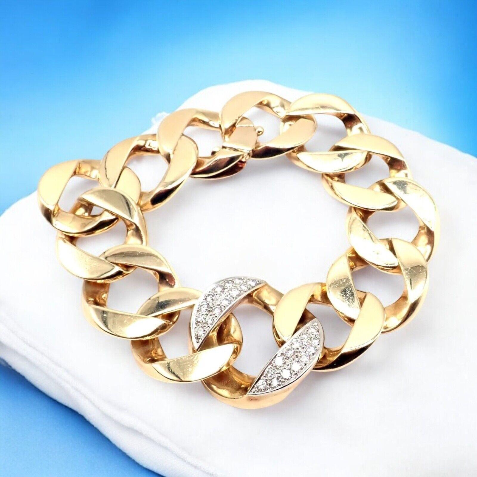 14k Yellow Gold And Diamond Vintage Large Heavy Curb Link Bracelet by Tiffany & Co.
Exquisite and substantial, this vintage Tiffany & Co curb link bracelet is meticulously crafted in luminous 14k yellow gold. 
Diamond accents add truly radiant