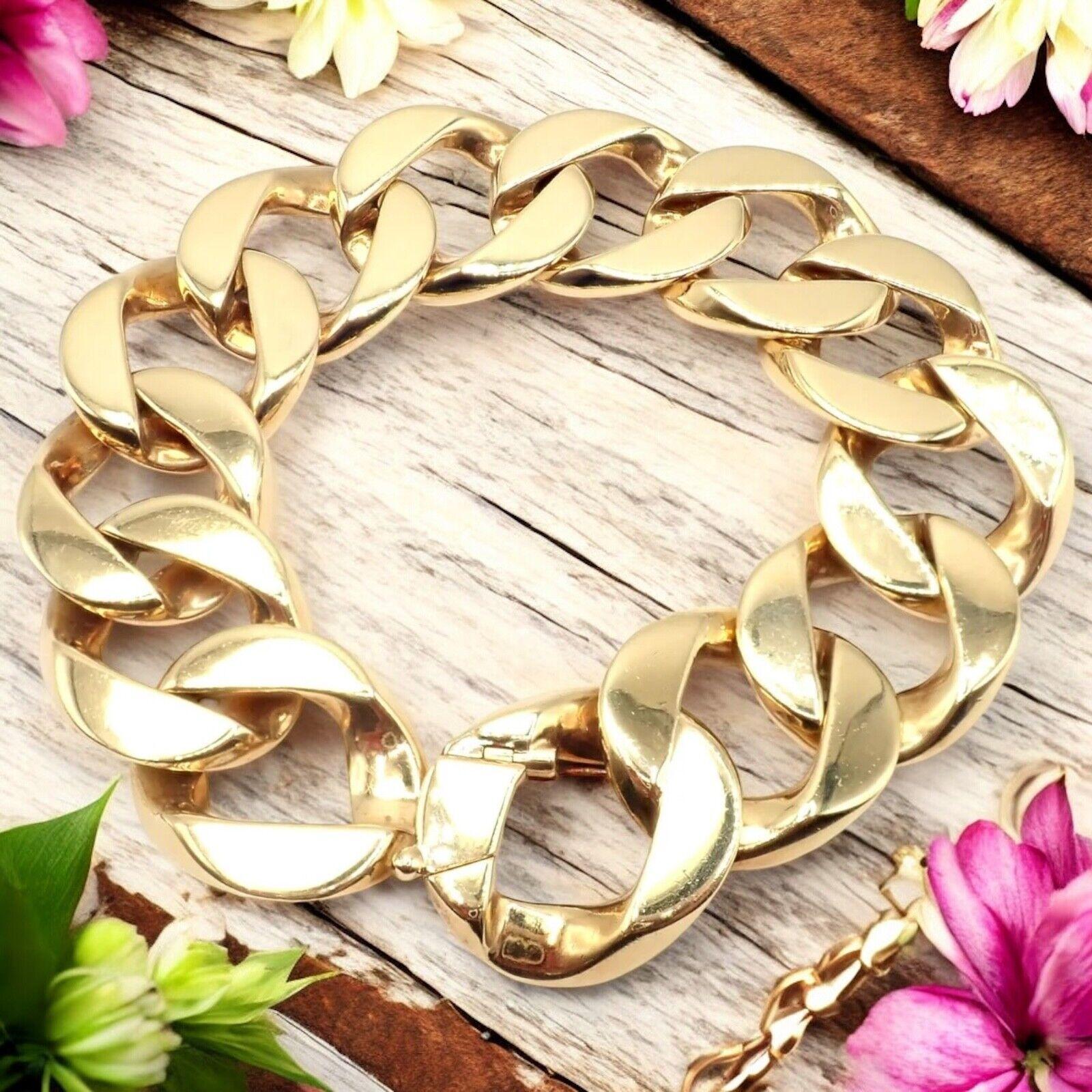 18k Gold Vintage Large Heavy Curb Link Bracelet by Tiffany & Co.
In this magnificent Tiffany & Co creation, a series of large, interlocking curb links shape a bold, statement-making silhouette, crafted in luminous 18k yellow gold. 
Exuding enduring