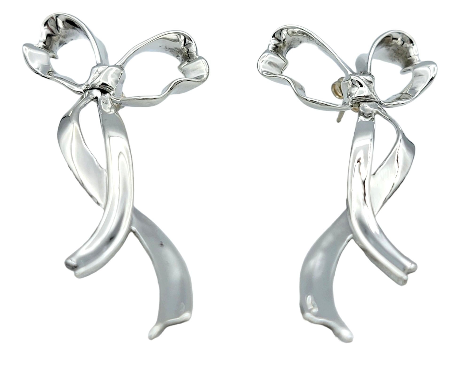 Contemporary Vintage Tiffany & Co. Large Ribbon Bow Earrings Set in Polished Sterling Silver For Sale