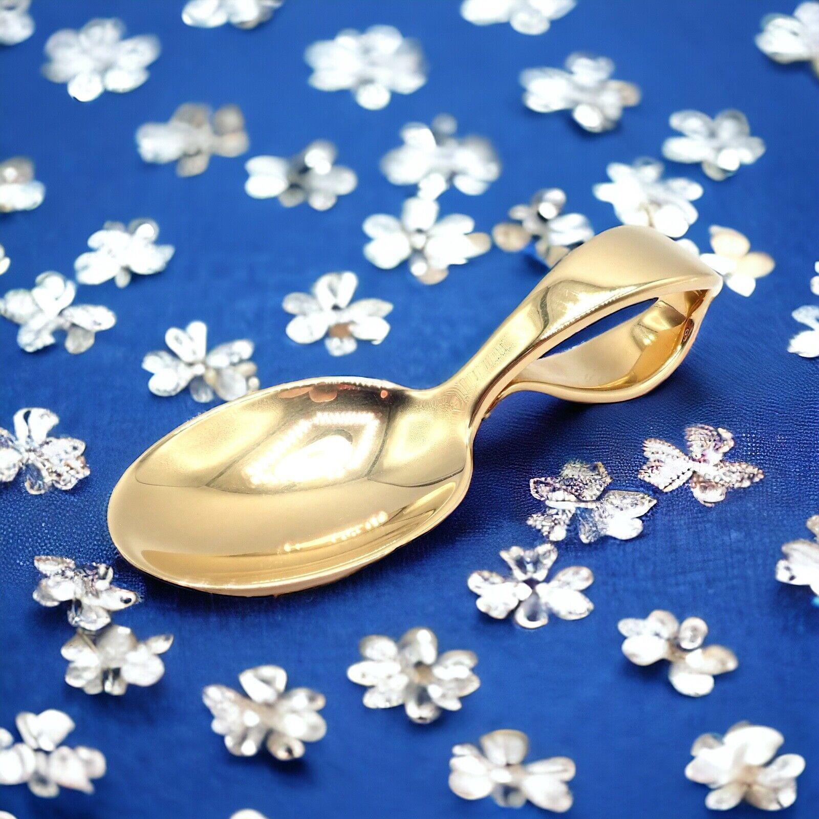 18k Solid Yellow Gold Vintage Baby Spoon by Tiffany & Co Makers.
This Vintage Estate Tiffany & Co. Makers baby spoon is crafted from 18k yellow gold, weighing 52.8 grams. 
Its elegant design and substantial weight reflect Tiffany's renowned