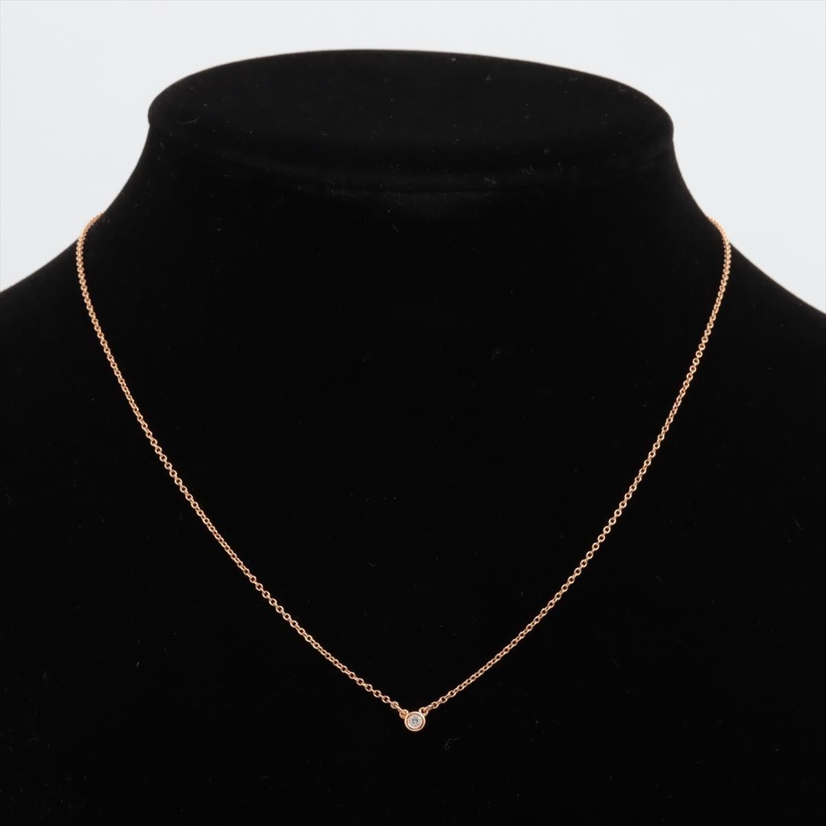 Tiffany and Co. 18k Yellow Gold and diamond necklace

Elsa Peretti Single diamond 