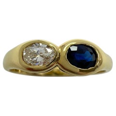 Weinlese Tiffany & Co. Ring aus 18 Karat Gelbgold mit blauem Saphir im Ovalschliff und Diamant