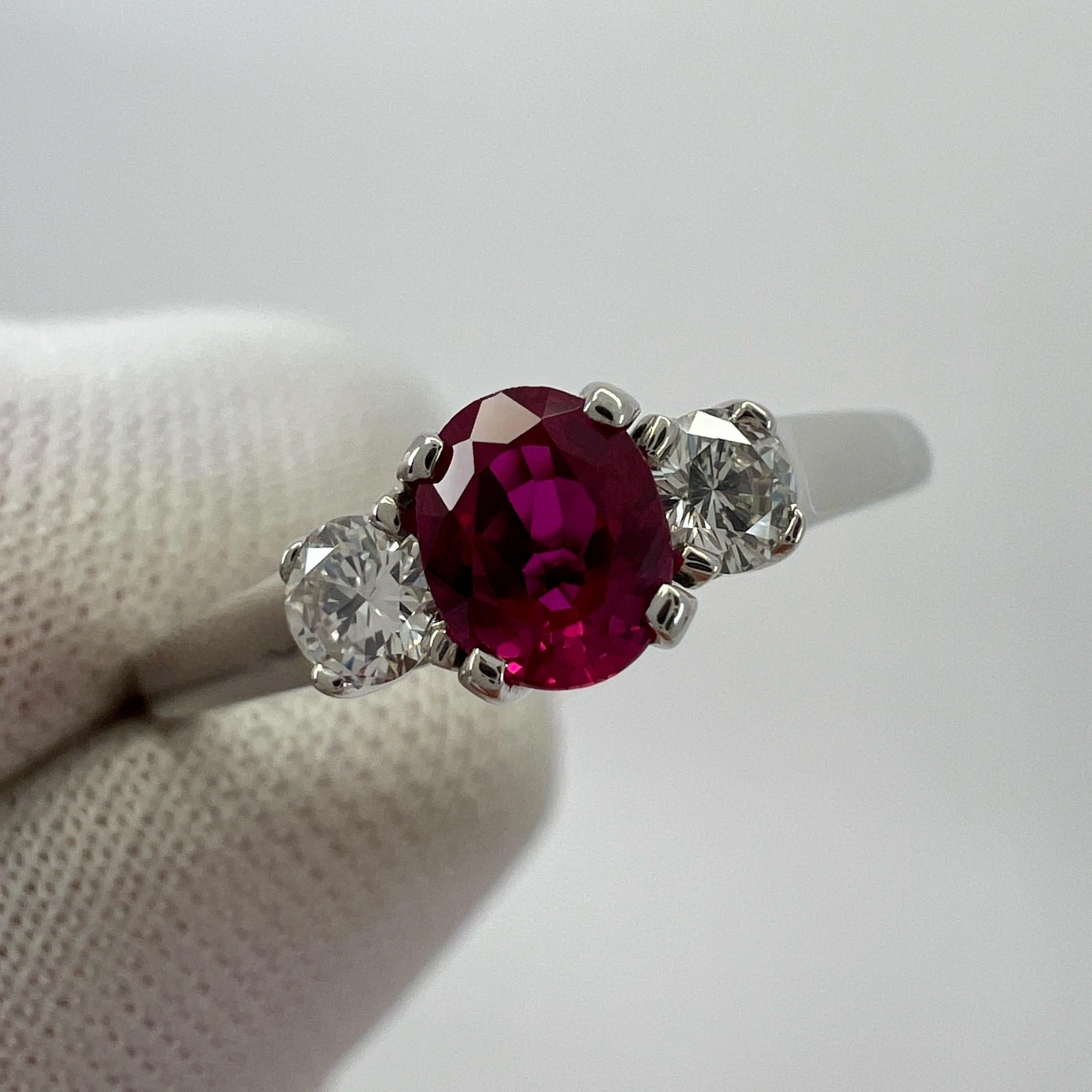 Vintage Tiffany & Co Oval Cut Pink Red Ruby & Diamond Platinum Three Stone Ring In Excellent Condition For Sale In Birmingham, GB