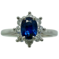 Vintage Tiffany & Co Oval Royal Blue Sapphire Diamond Platinum Halo Cluster Ring