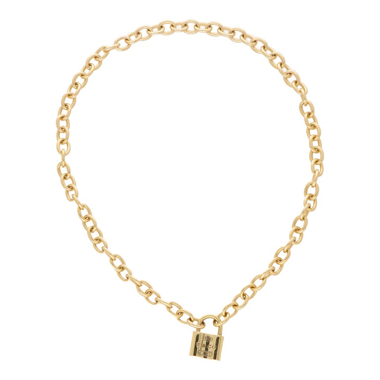 A vintage Tiffany & Co. open link ‘ Padlock’ necklace set in 18k yellow gold.

The necklace is composed of 70 oval solid yellow gold links; all of which are connected together by a Tiffany & Co. padlock clasp. Due to the subtlety of the design, this