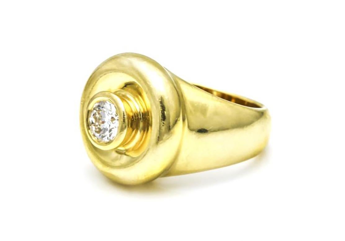 Vintage Tiffany & Co. Paloma Picasso diamond ring in 18 karat yellow gold. Bezel set Tiffany diamond center stone. Diamond total carat weight, .51 carat. Size 5. Weight, 13.2 grams. We can size ring to your specifications at no additional cost.