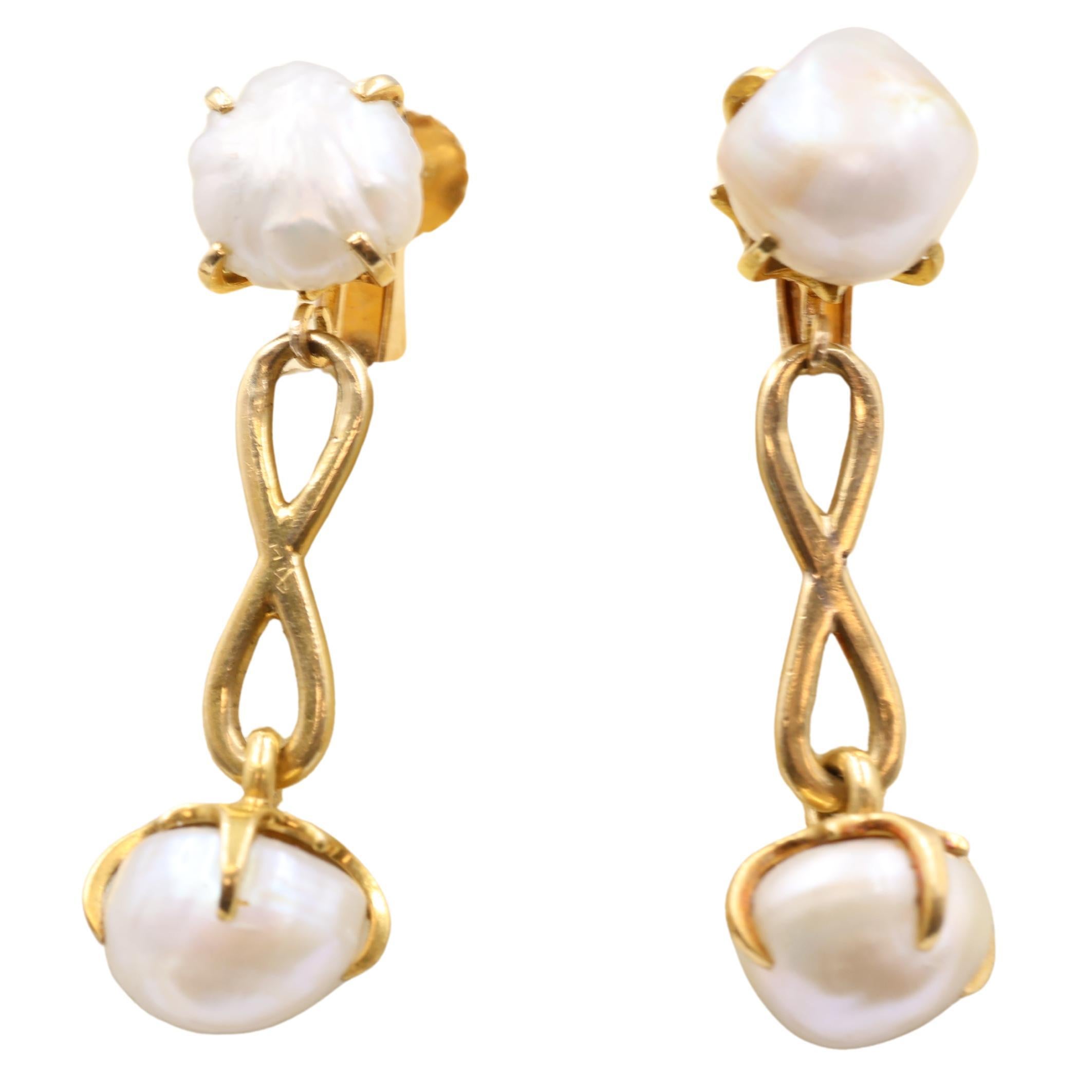 Boucles d
oreilles à pince en or 18k et perles de Tiffany
Co Vintage