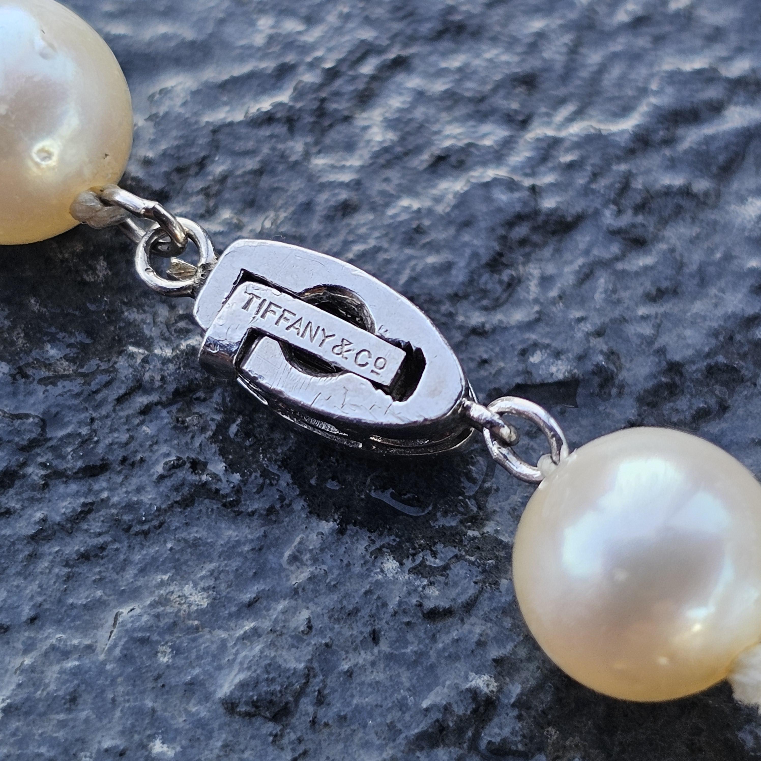 Tiffany & Co. d'epoca. Collana con fili di perle in platino 85% Chiusura con diamanti 14k 20