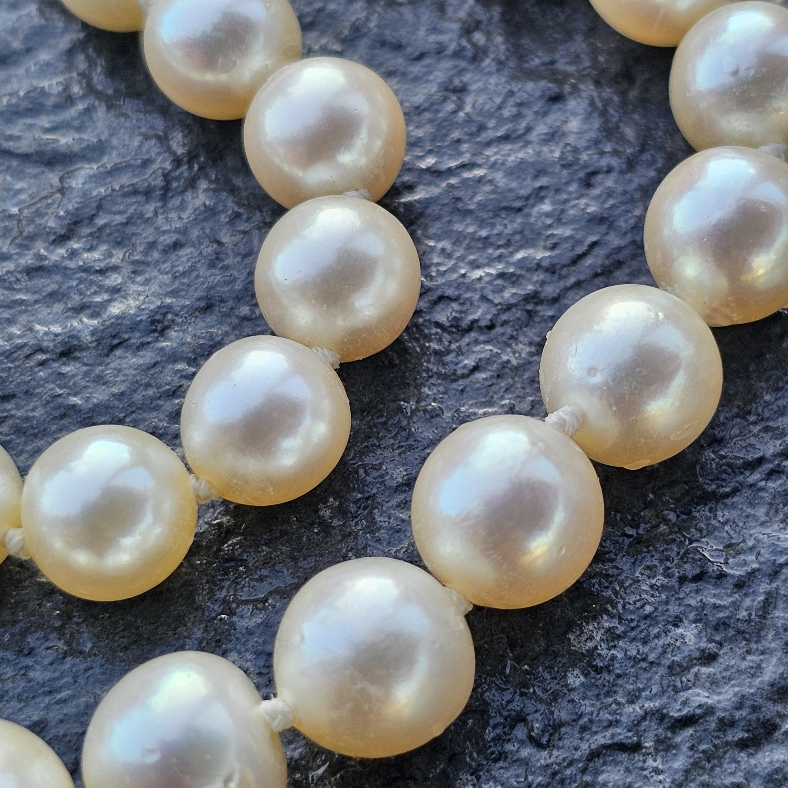 Tiffany & Co. d'epoca. Collana con fili di perle in platino 85% Chiusura con diamanti 14k 20