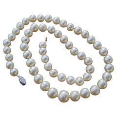 Tiffany & Co. d'epoca. Collana con fili di perle in platino 85% Chiusura con diamanti 14k 20"