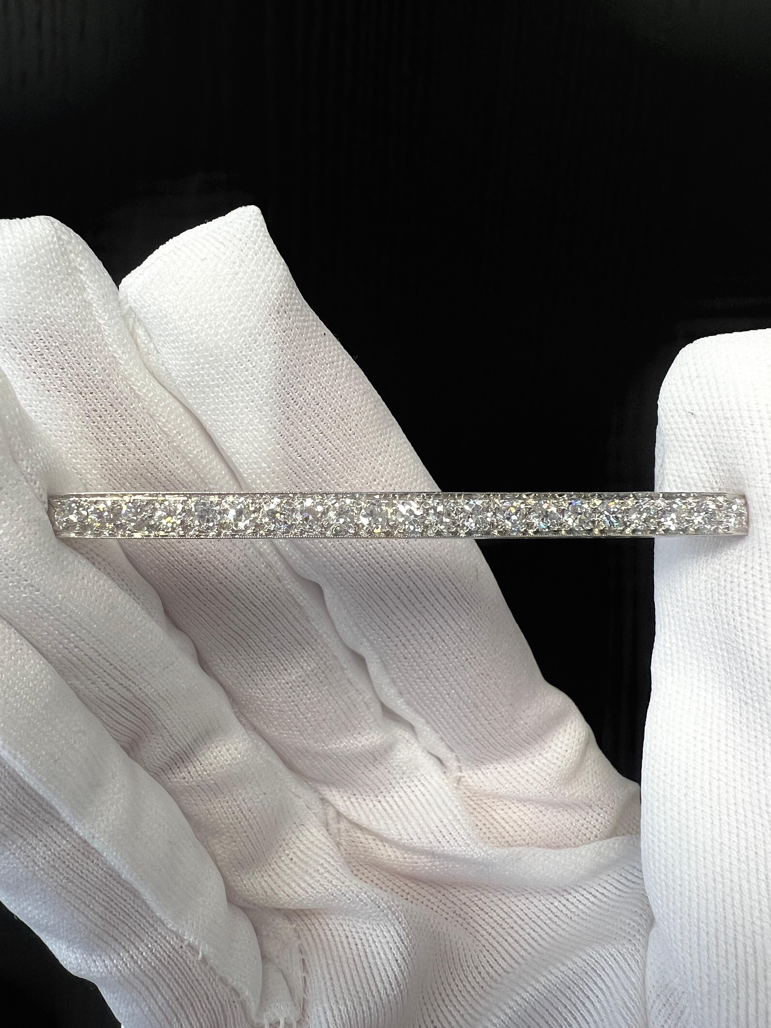 Vintage Tiffany & Co Platinum Diamond and 18k Gold  Bar Brooch

Details:
Approx. 2.50 cts diamonds, Platinum and Gold material, weight 7.7 grams

In excellent condition.