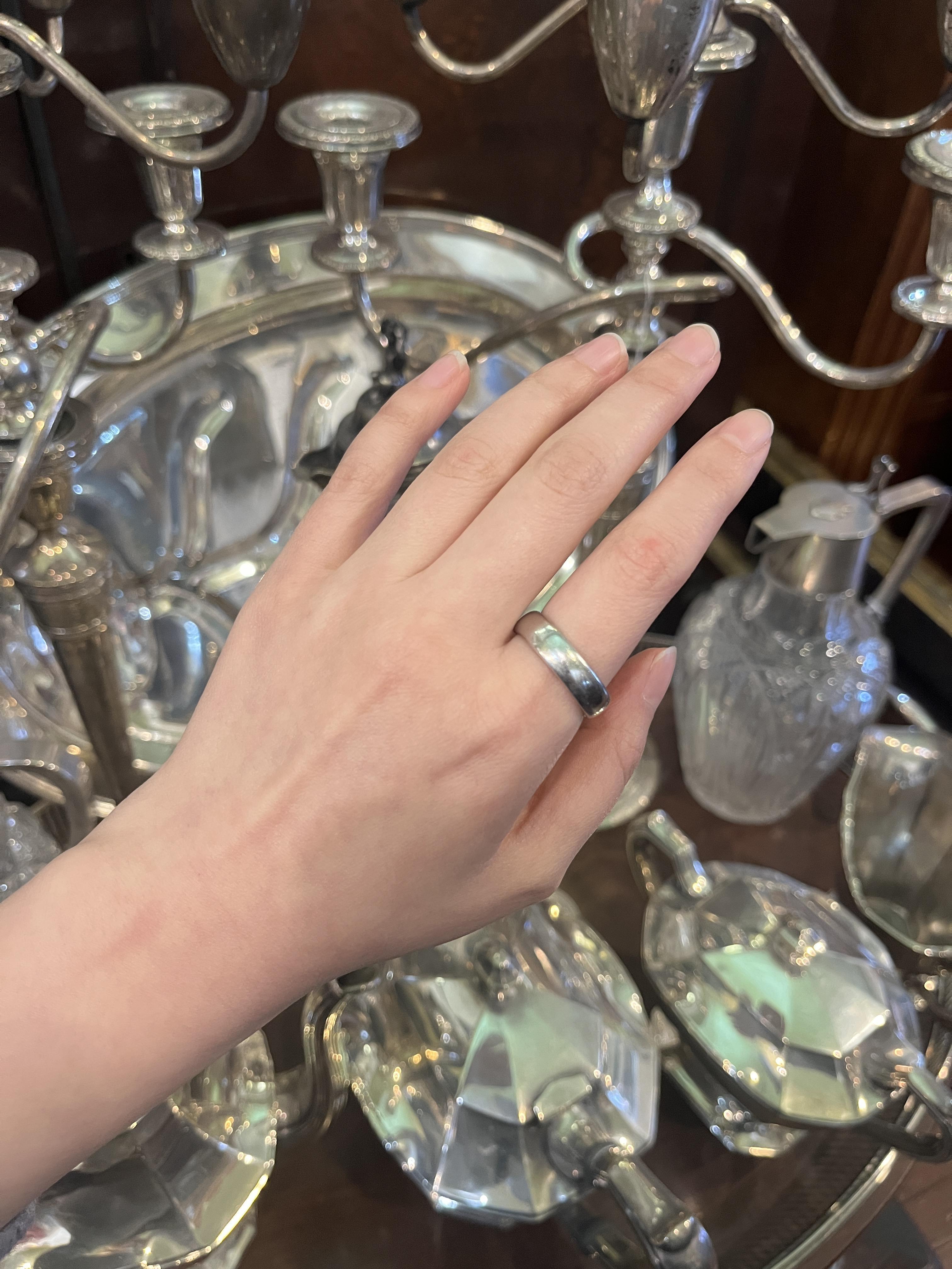 Vintage Tiffany & Co. Platinum Ring

Marked:
TIFFANY & Co. 
PT 950

Approximate Dimensions: 
9.5 (Ring Size) 
0.5 cm (Width) 
15.0 grams in weight.