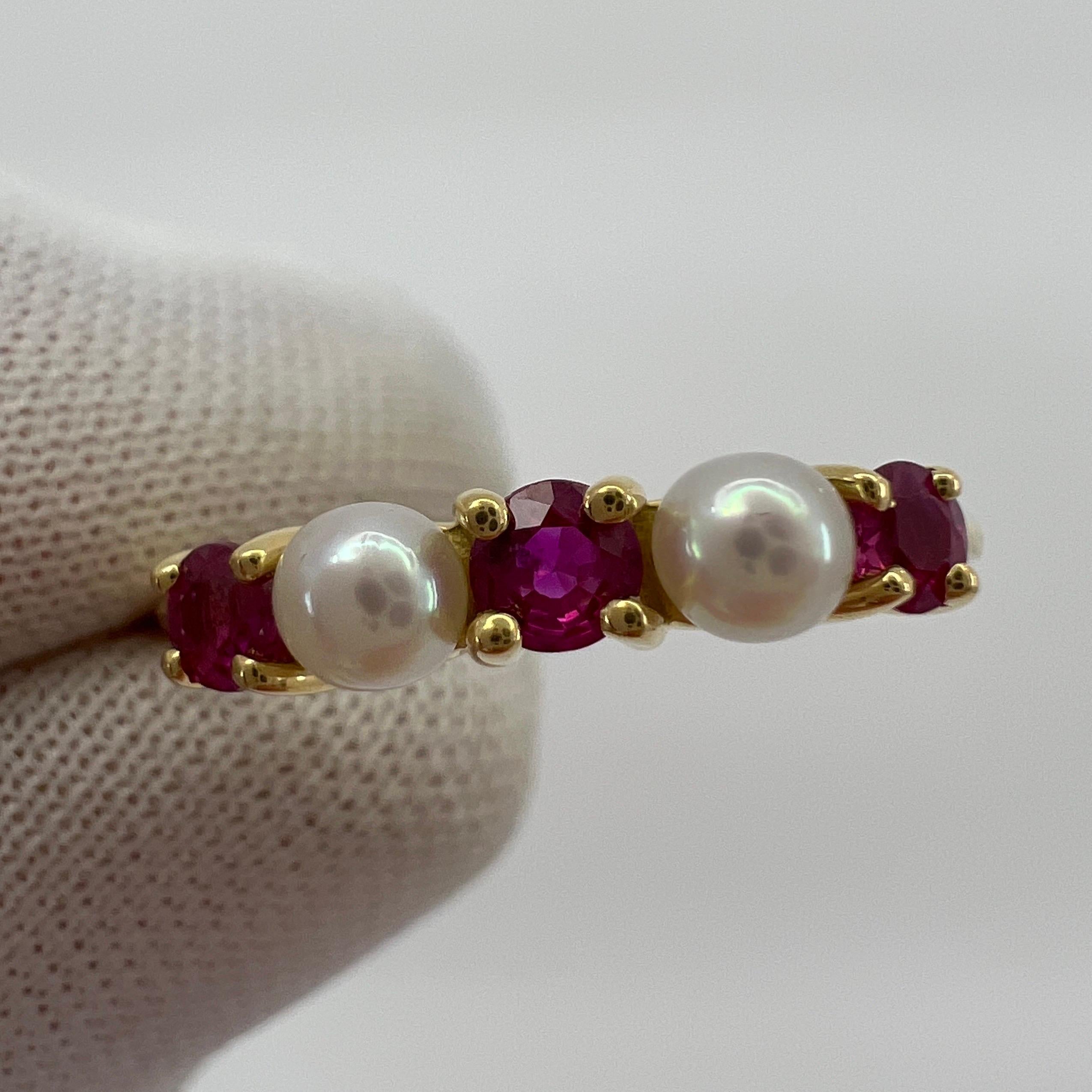 Tiffany & Co. Ruby & Pearl 18k Yellow Gold Eternity Ring.

A beautifully made yellow gold eternity ring set with three stunning 2.8mm vivid red round cut rubies. Very nice colour, clarity and cut. Also set with two 3.2mm pearls.

Fine jewellery