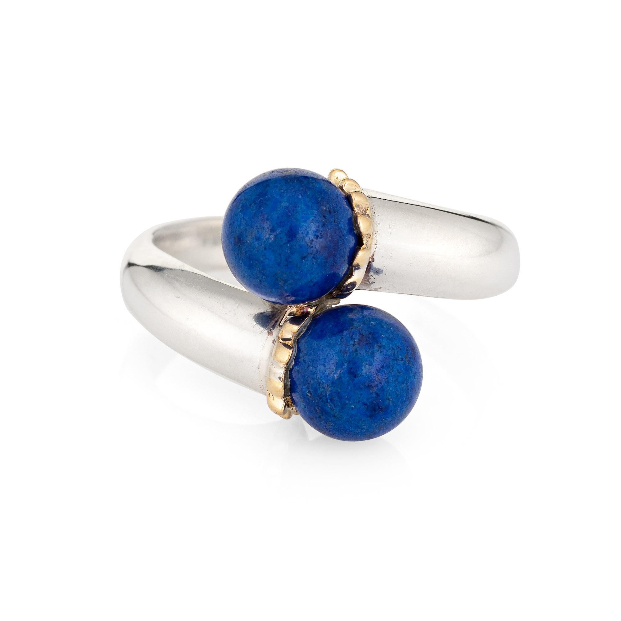 Finely detailed vintage Tiffany & Co lapis lazuli bypass ring (circa 1980s to 1990s) crafted in sterling silver & 18 karat yellow gold. 

Lapis lazuli beads each measure 7mm. The lapis is in very good condition and free of cracks or chips. 

The