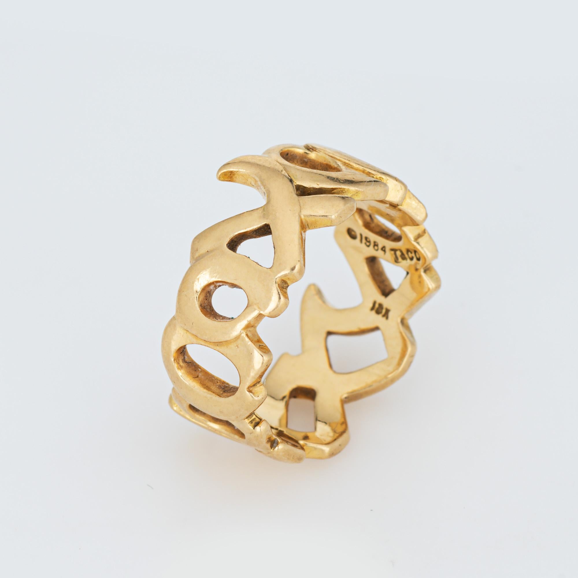 Vintage Tiffany & Co 'XO' ring designed by Paloma Picasso, crafted in 18 karat yellow gold (circa 1984).  

The 'XO' love and kisses pattern is a great 80s era design by Paloma Picasso. The band has a flat design and high polished finished,