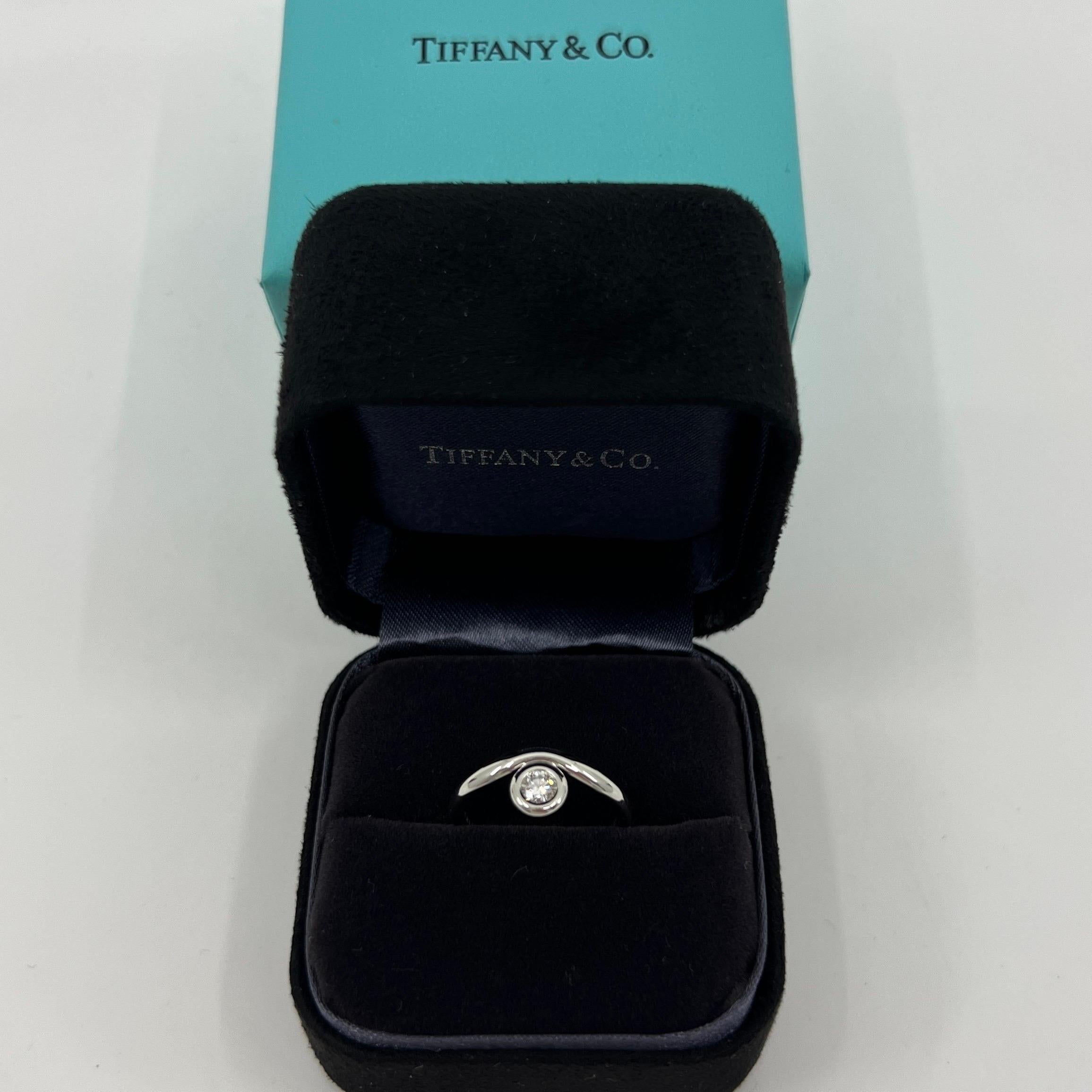 Round Cut Vintage Tiffany & Co. Round Bezel Brilliant Cut Diamond Platinum Solitaire Ring