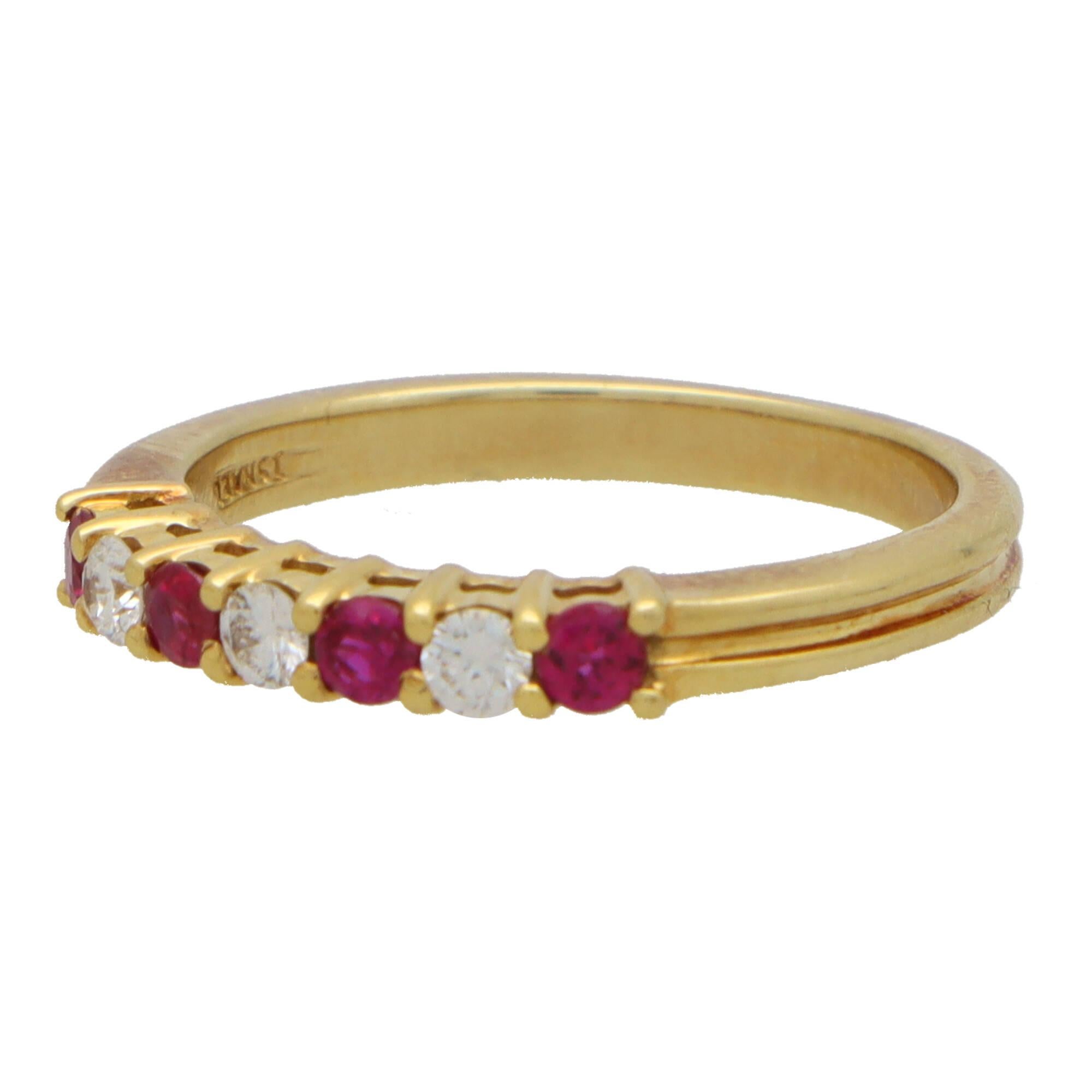 A beautiful vintage Tiffany & Co. diamond and ruby half eternity ring set in 18k yellow gold.

The ring is composed of 7 round cut stones altogether, four of which being rubies and three diamonds. All the stones are securely claw set within a