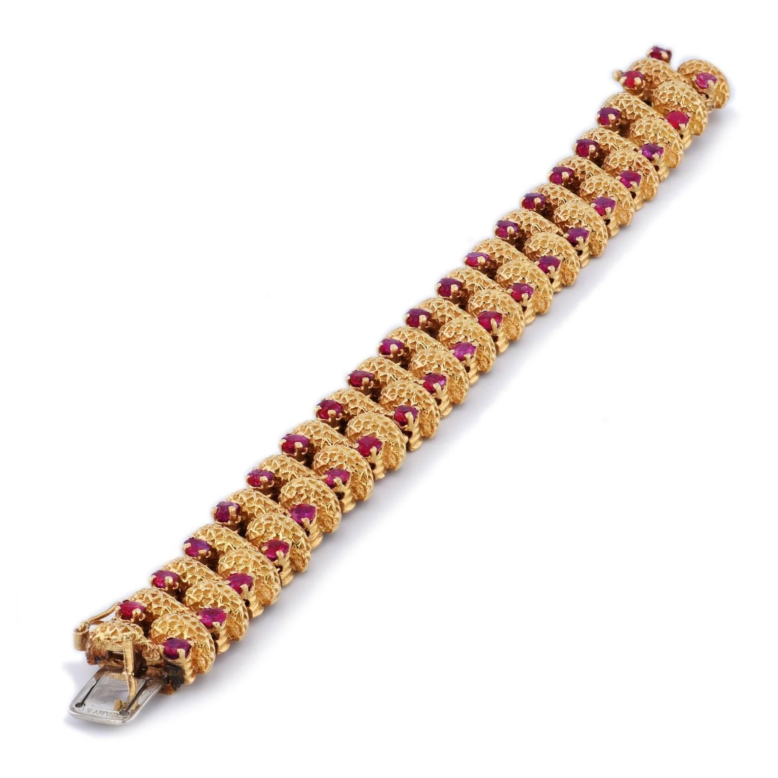 Be blown away by this vintage 1960s Tiffany & Co. ruby bracelet fashioned in 18 karat yellow gold. A find of this magnitude is truly a treasure to behold. Make this piece yours.