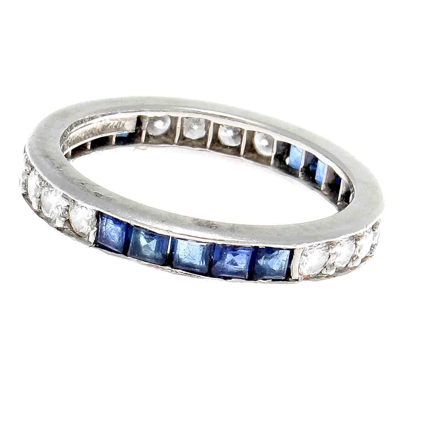 Tiffany is the leader in quality and design of engagement and wedding rings. Their ingenuity has lead them to over 100 years of excellence.Featuring a unique combination of square cut navy blue sapphires alternating with sections of colorless