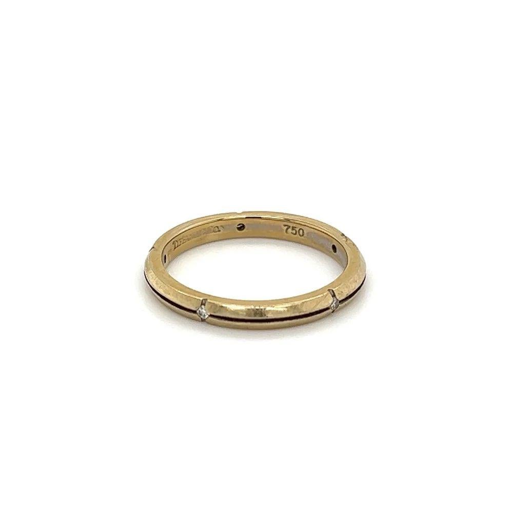 Simply Beautiful! Iconic Tiffany & Co! 18K Yellow Gold Scattered 0.05tcw Diamond Band Ring. Ring size, 6.25, we offer ring resizing. Circa 2002. More Beautiful in Real time! Chic and Classic…Ideal worn alone or as an alternative Wedding Band