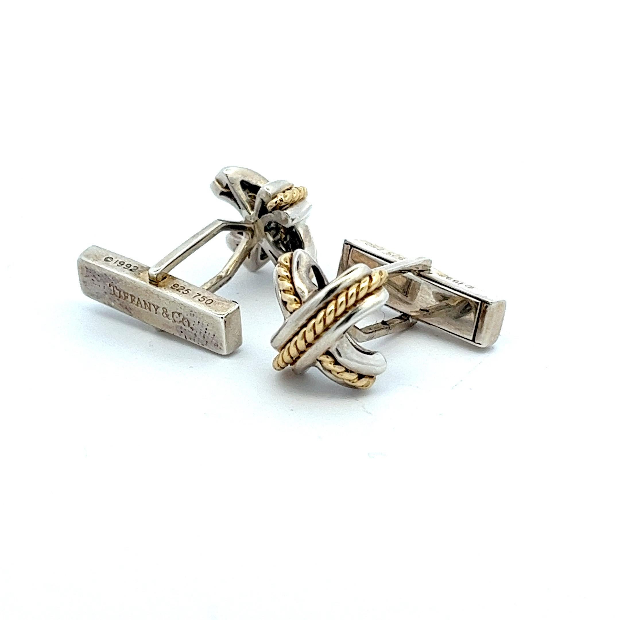 Tiffany & Co.'s cufflinks, belonging to the notable Signature X Cross collection, are designed with sterling silver in the form of an 