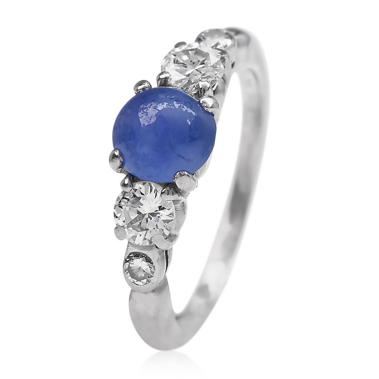 This Classic  Vintage Tiffany & Co. diamond sapphire ring Ring, 

 crafted in solid Palladium, the center is adorned by Natural Star Sapphire, weighing approximately 2.00 carats. With a star asterism top display. Complimenting the sides, there are