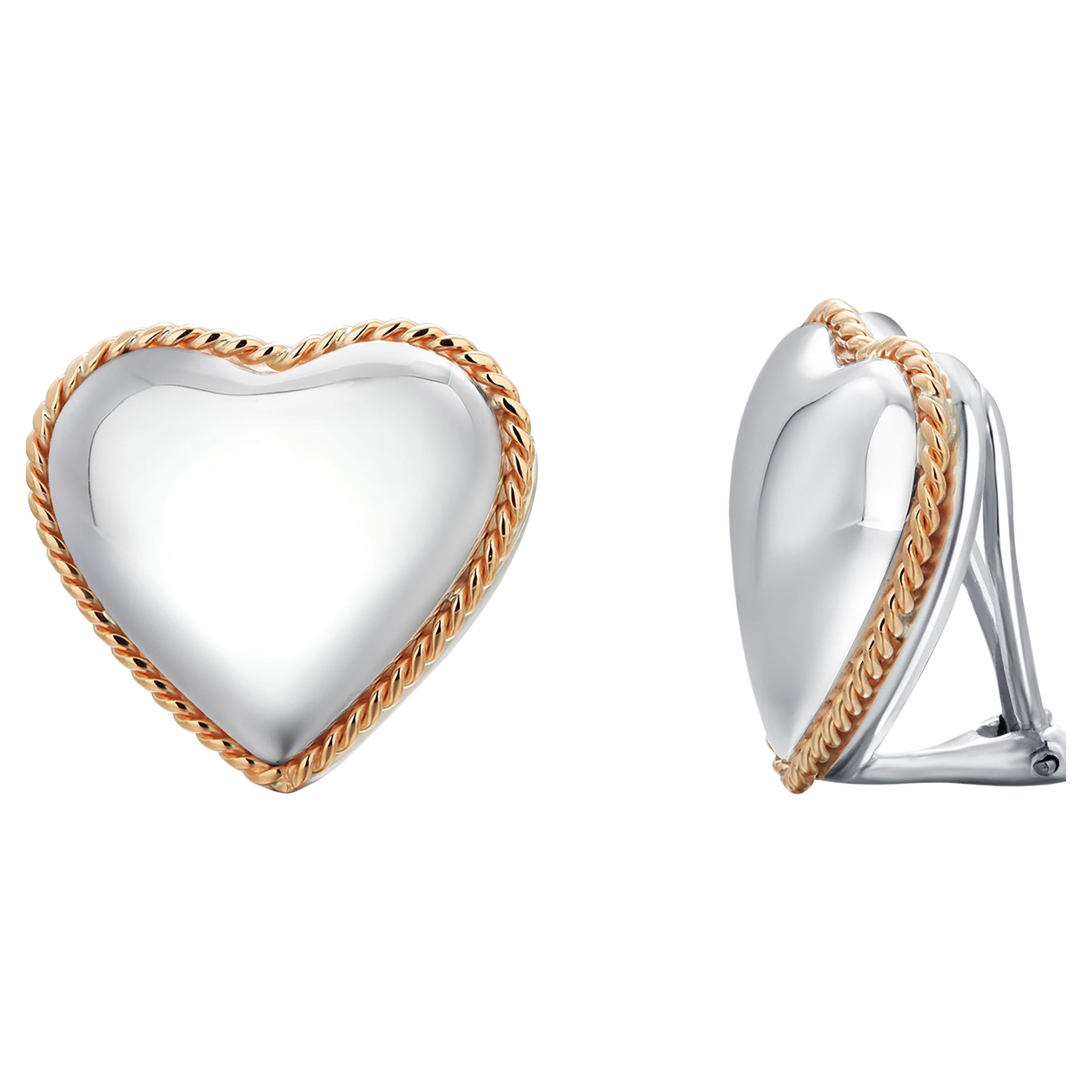 Tiffany Co. Boucles d'oreilles vintage en forme de cœur en argent sterling et or jaune 14 carats  en vente