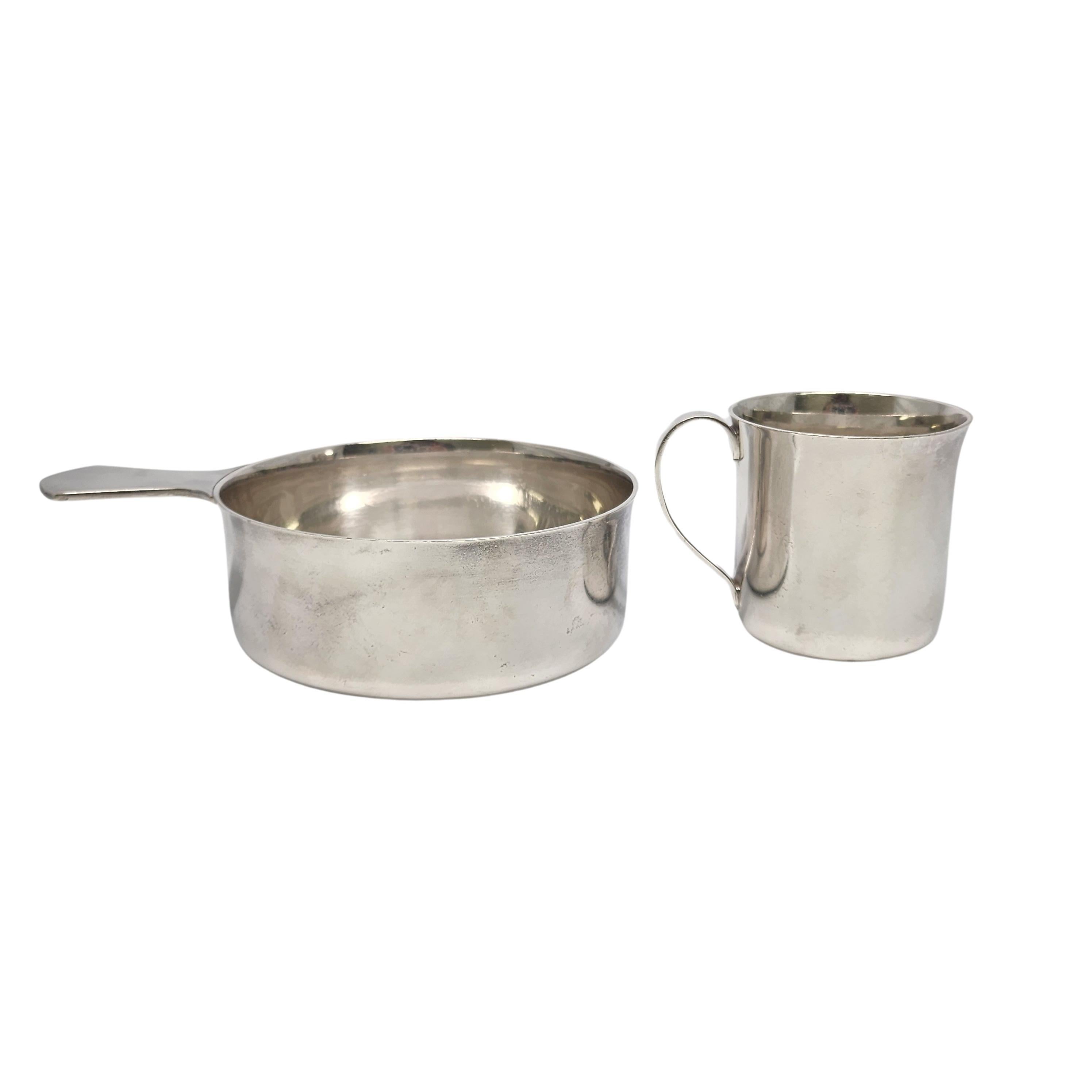 Vintage Tiffany & Co sterling silver baby cup and porringer bowl.

No monogram

A simple and classic polished design on both pieces make for a timeless and classic baby set. Hallmarks date this piece to manufacture under the directorship of Louis