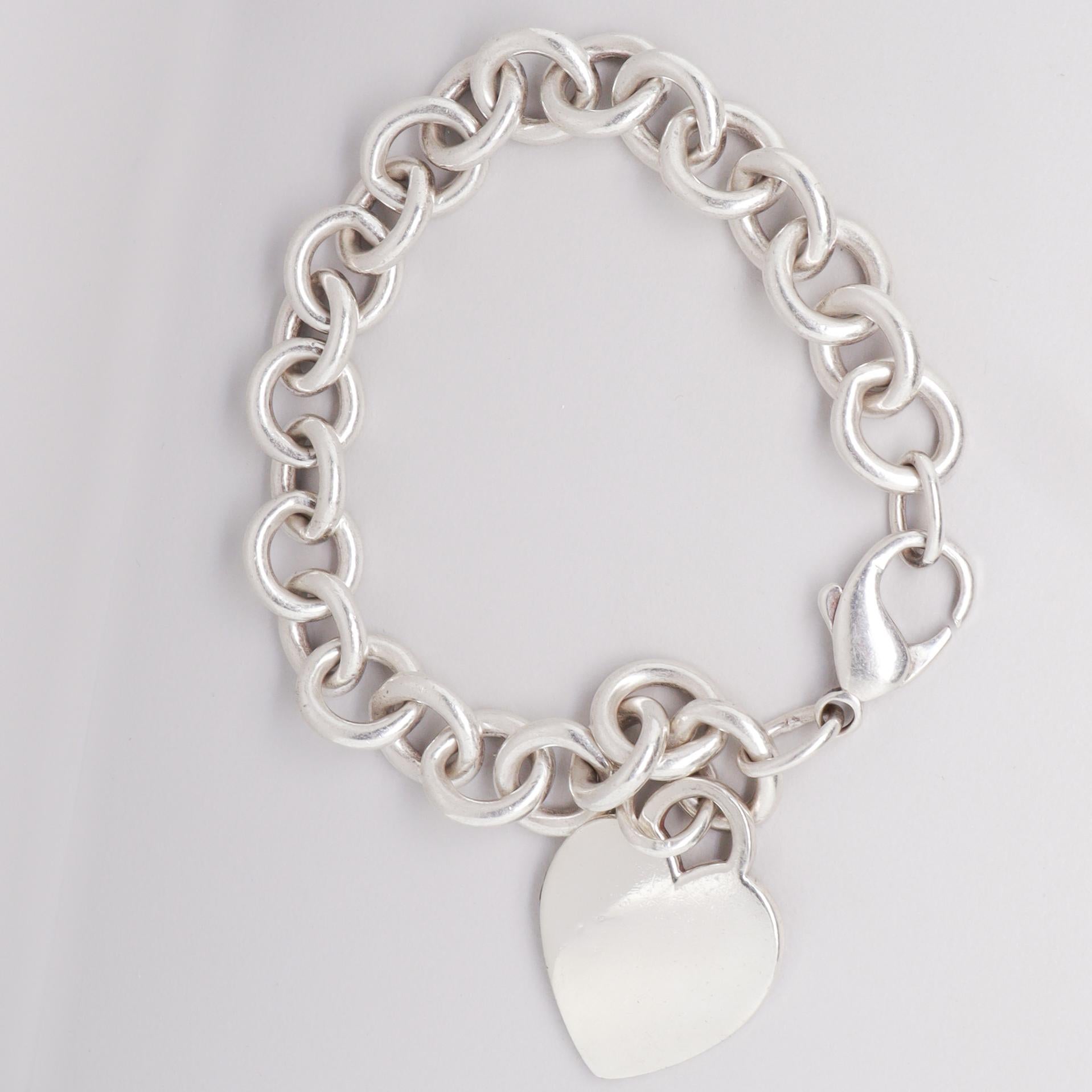 A. Link & Co. d'epoca in argento sterling con etichetta / charm a cuore in vendita 1