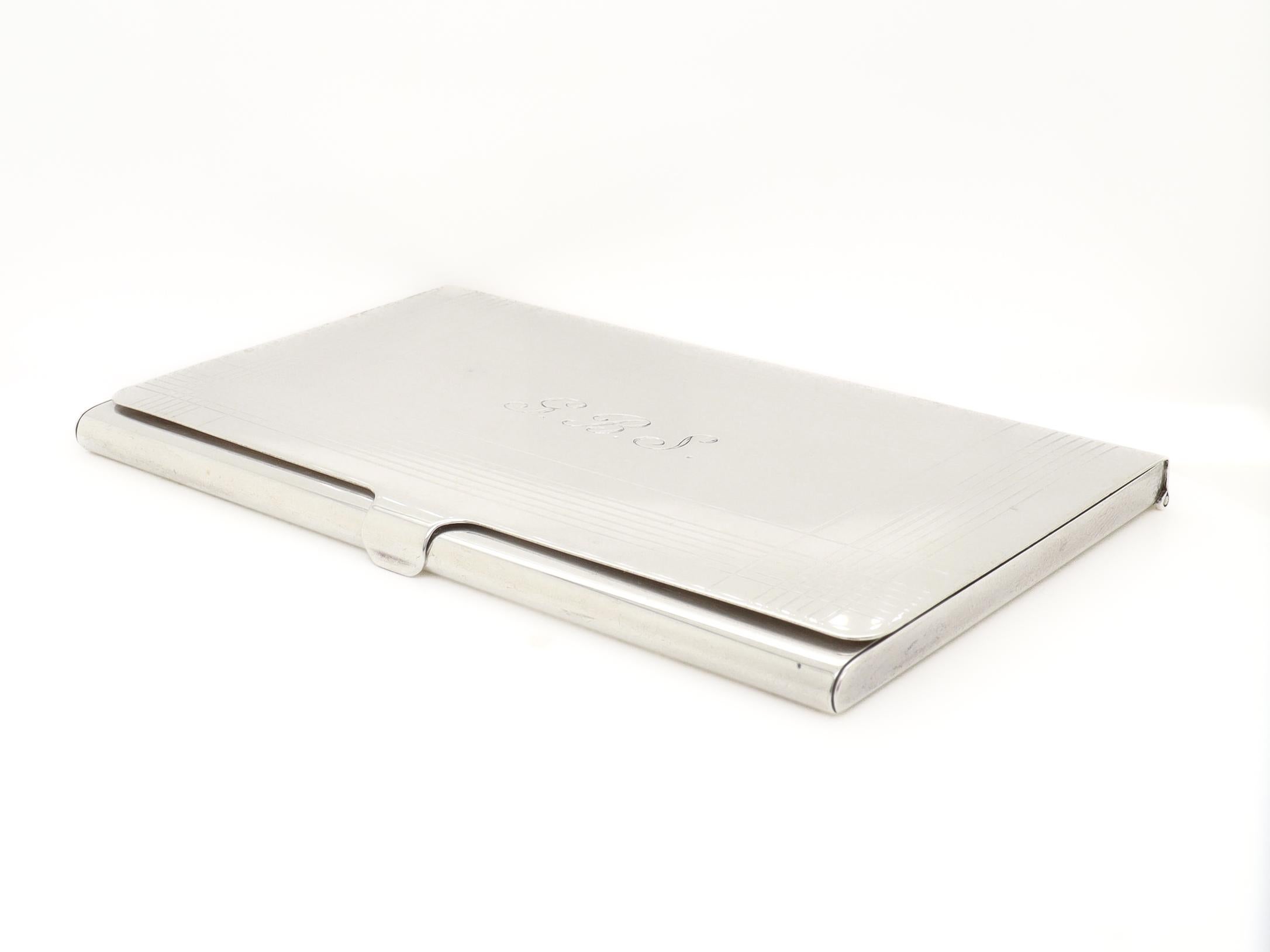A fine signed vintage business card holder.

In sterling silver.

By Tiffany & Co.

Engraved to the front and monogrammed 'G.B.S.'. 

Marked to the reverse.

Simply a wonderful Tiffany accessory!

Date:
20th Century

Overall Condition:
It is in