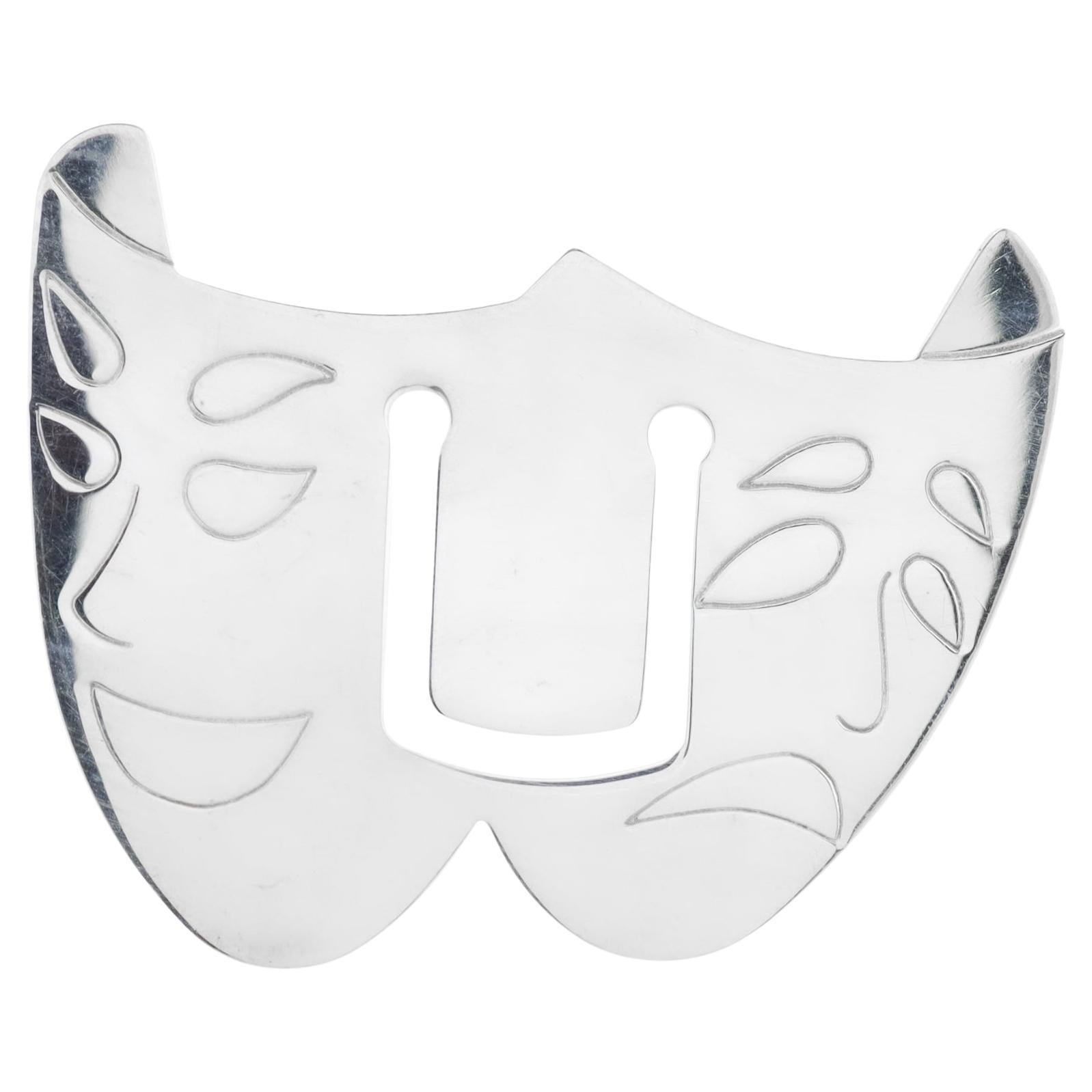 A fine signed bookmark or paperclip.

In sterling silver.

By Tiffany & Co.

In the form of comedy & tragedy masks.

Together with its original pouch.

Simply a wonderful Tiffany design!

Date: 
20th Century or 21st Century

Overall Condition:
It is